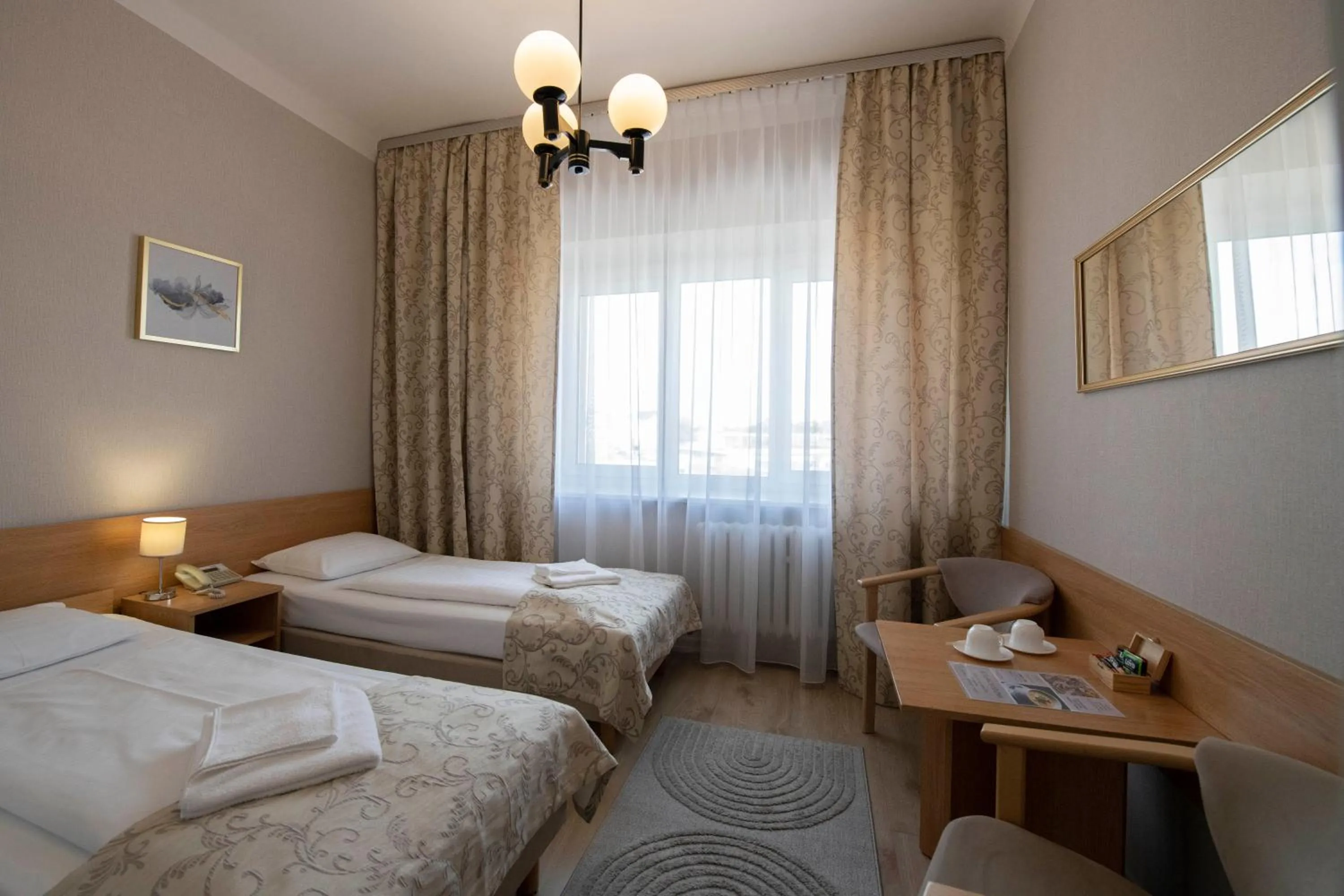 Seating area, Bed in Hotel Polonia