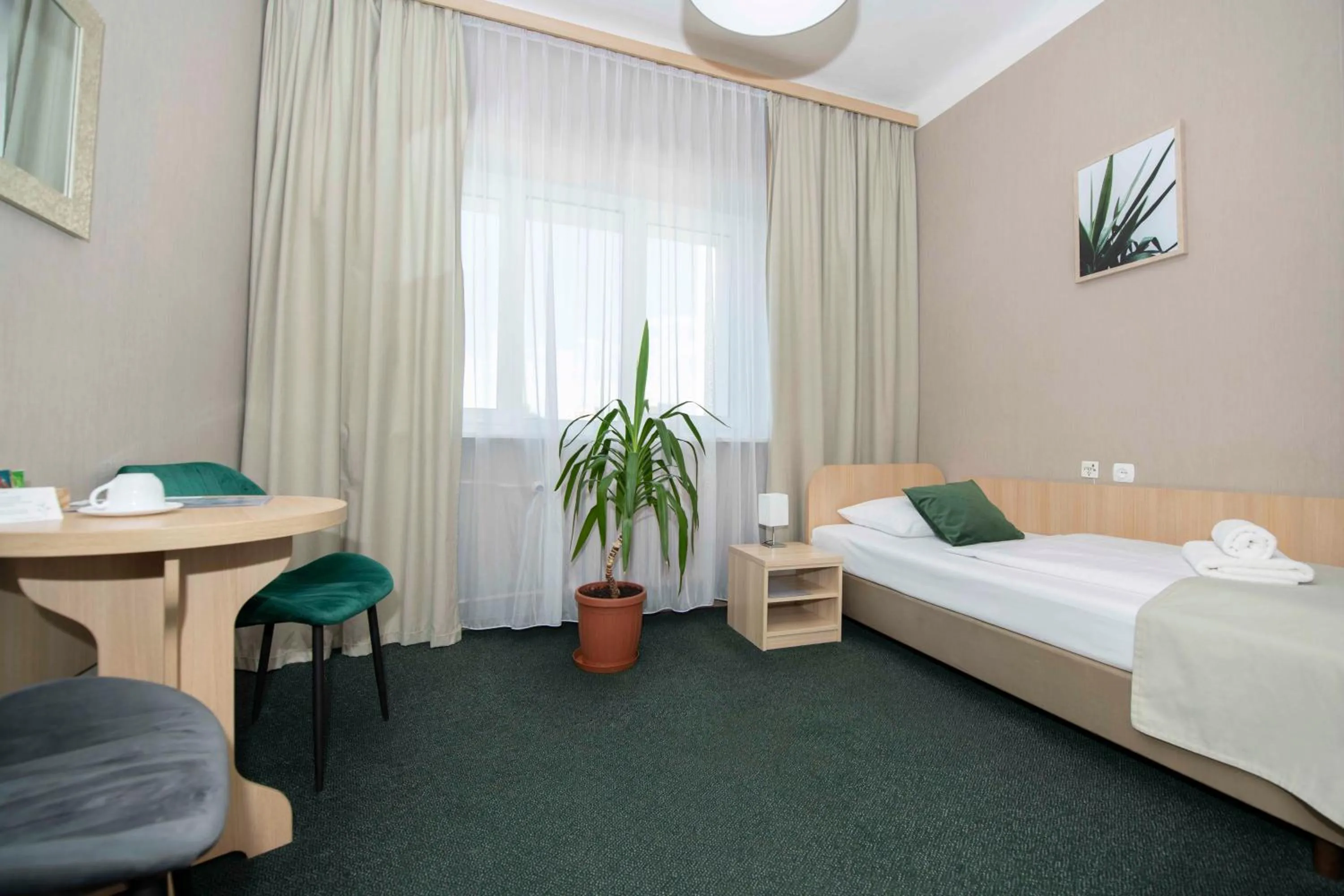 Seating area, Bed in Hotel Polonia