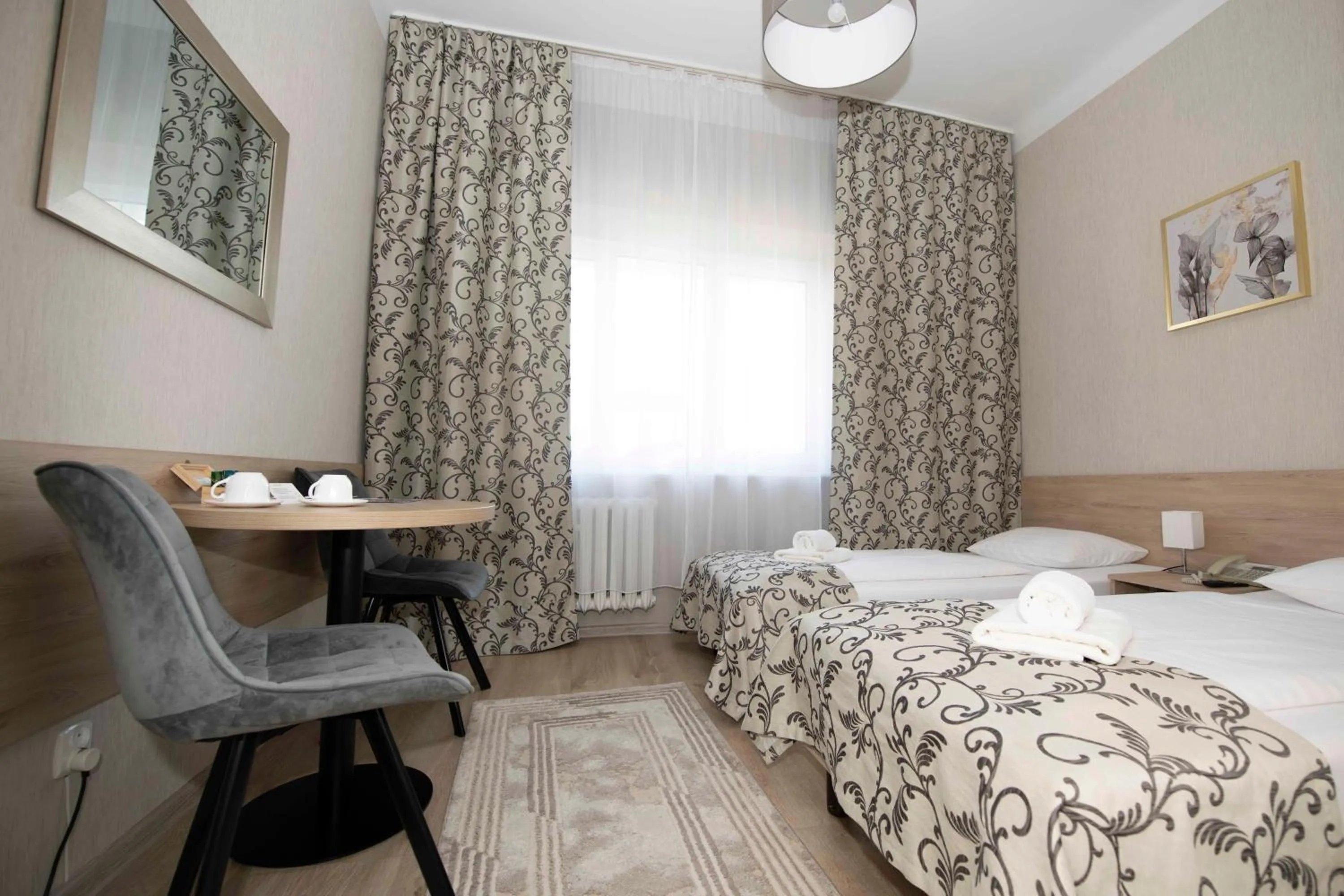 Seating area, Bed in Hotel Polonia