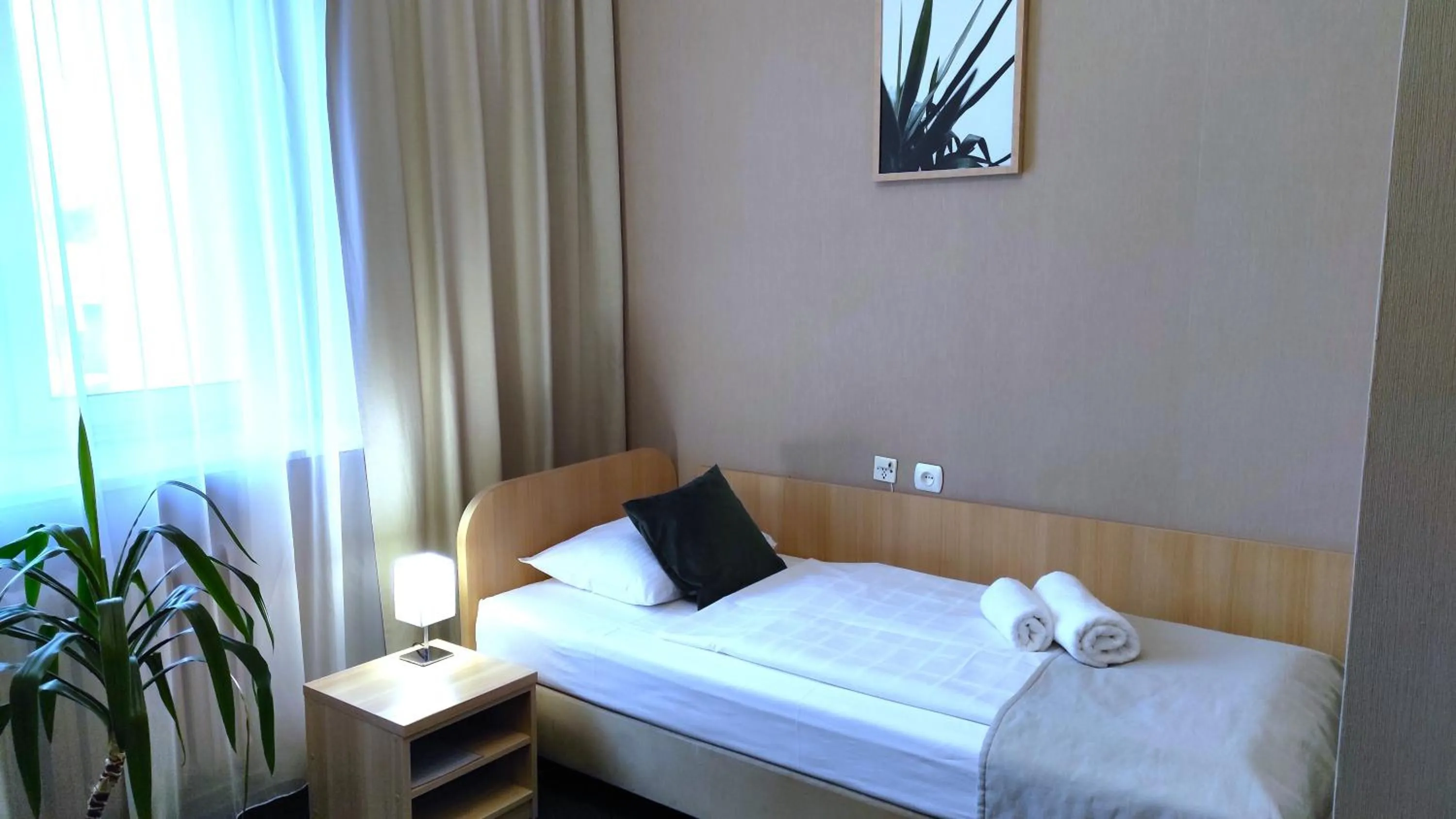 Seating area, Bed in Hotel Polonia