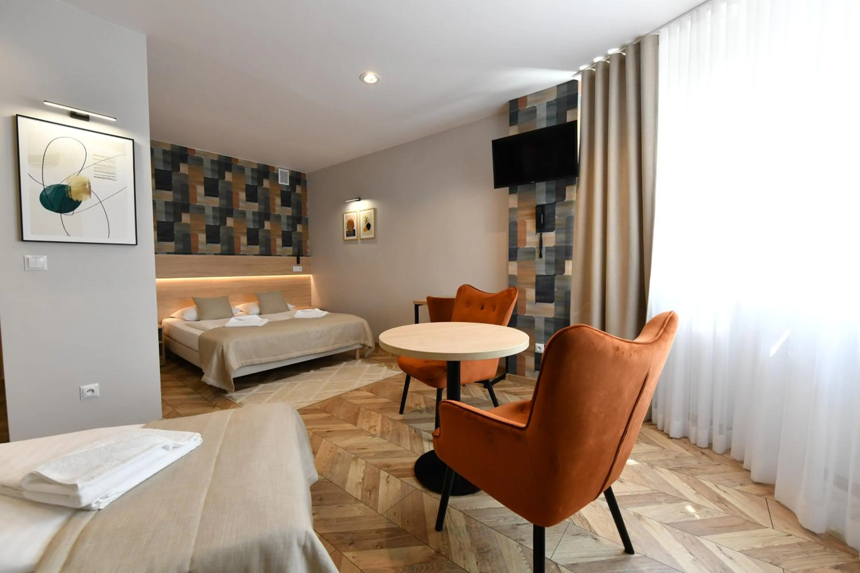 Seating area, Bed in Hotel Polonia