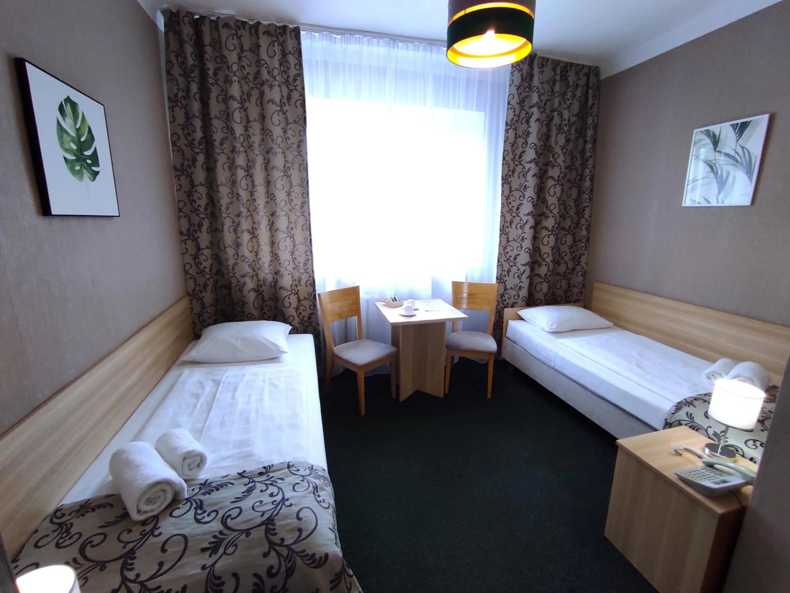 Seating area, Bed in Hotel Polonia