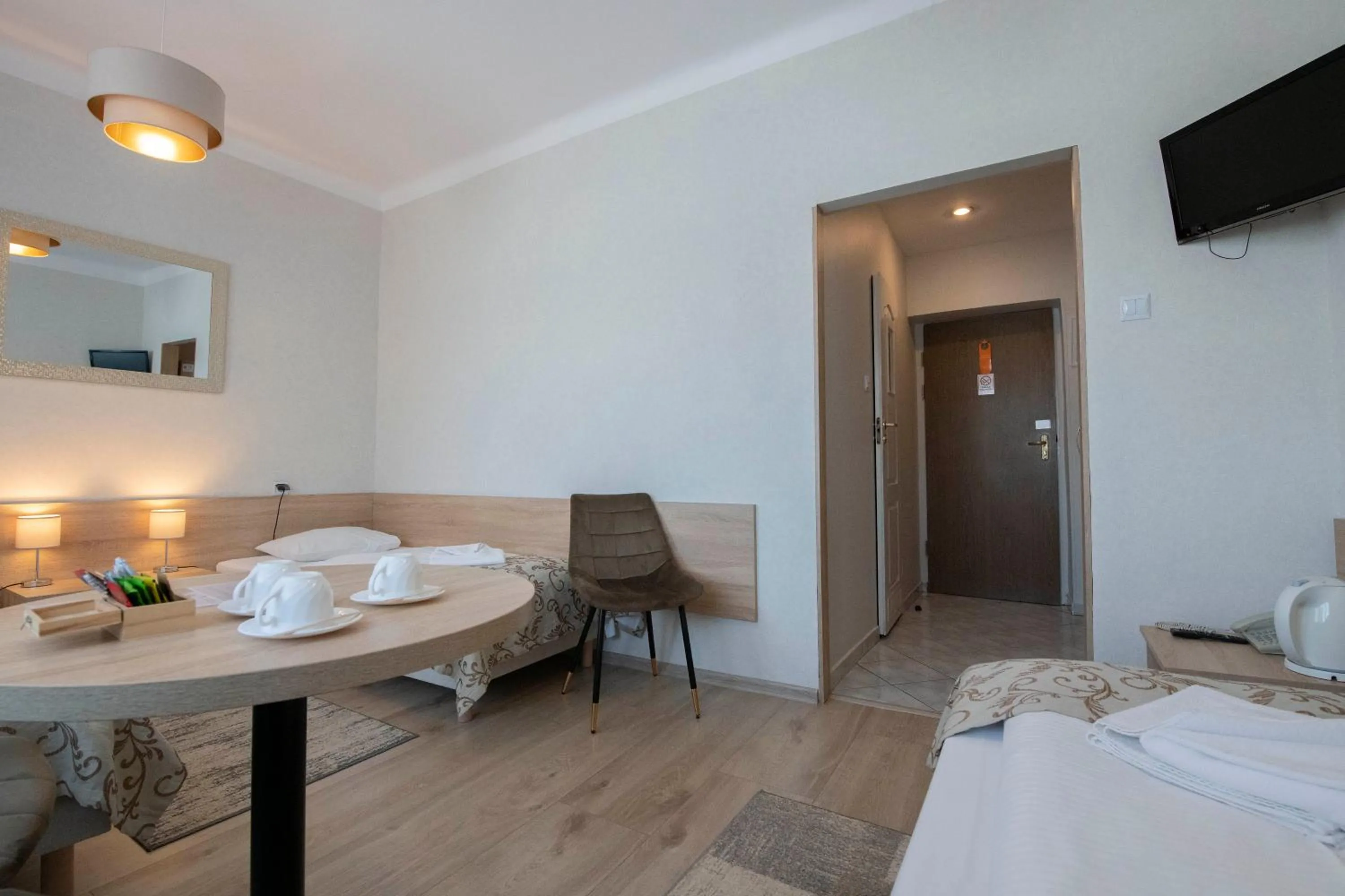 Seating area, Bed in Hotel Polonia