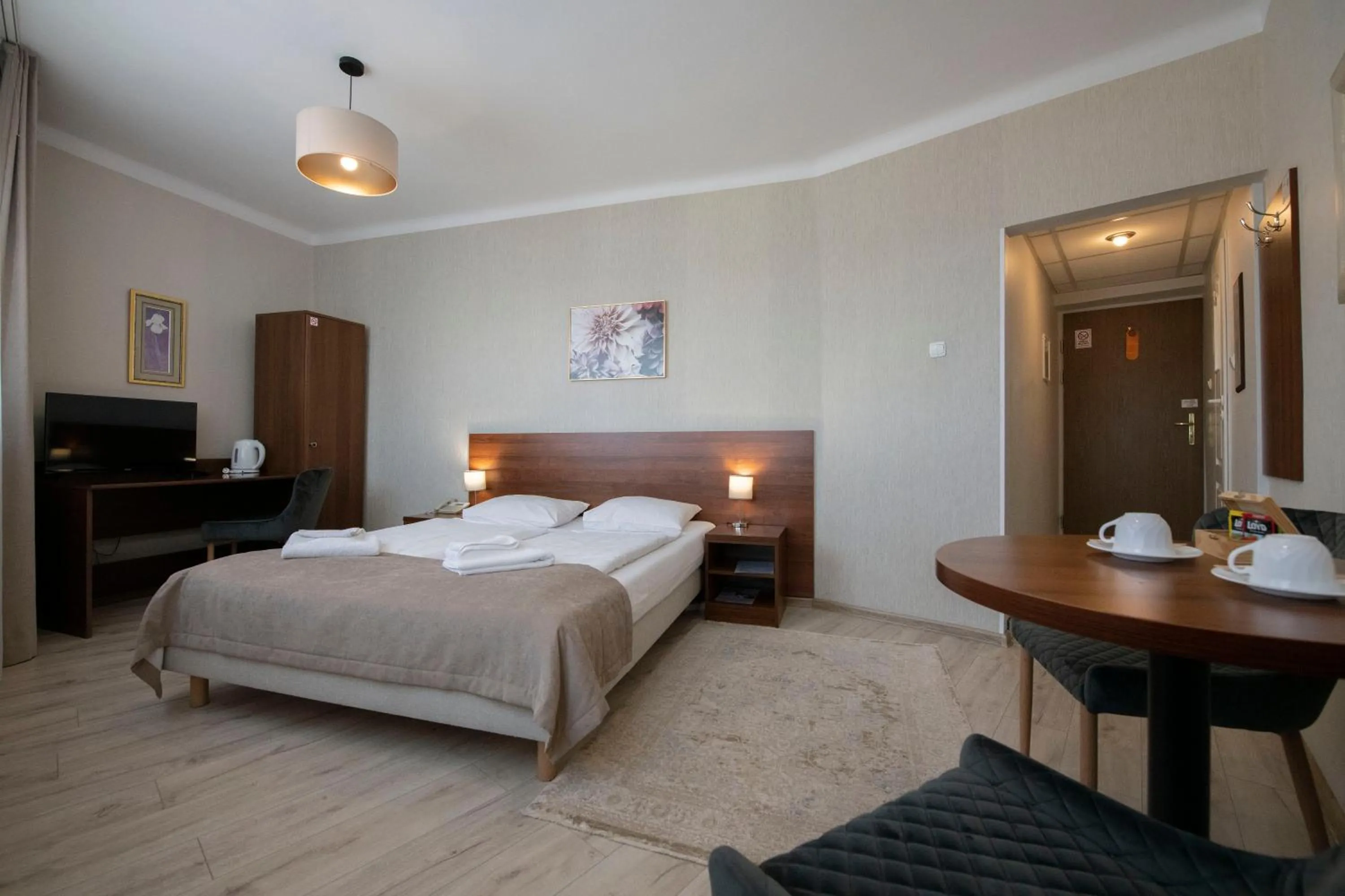 Seating area, Bed in Hotel Polonia