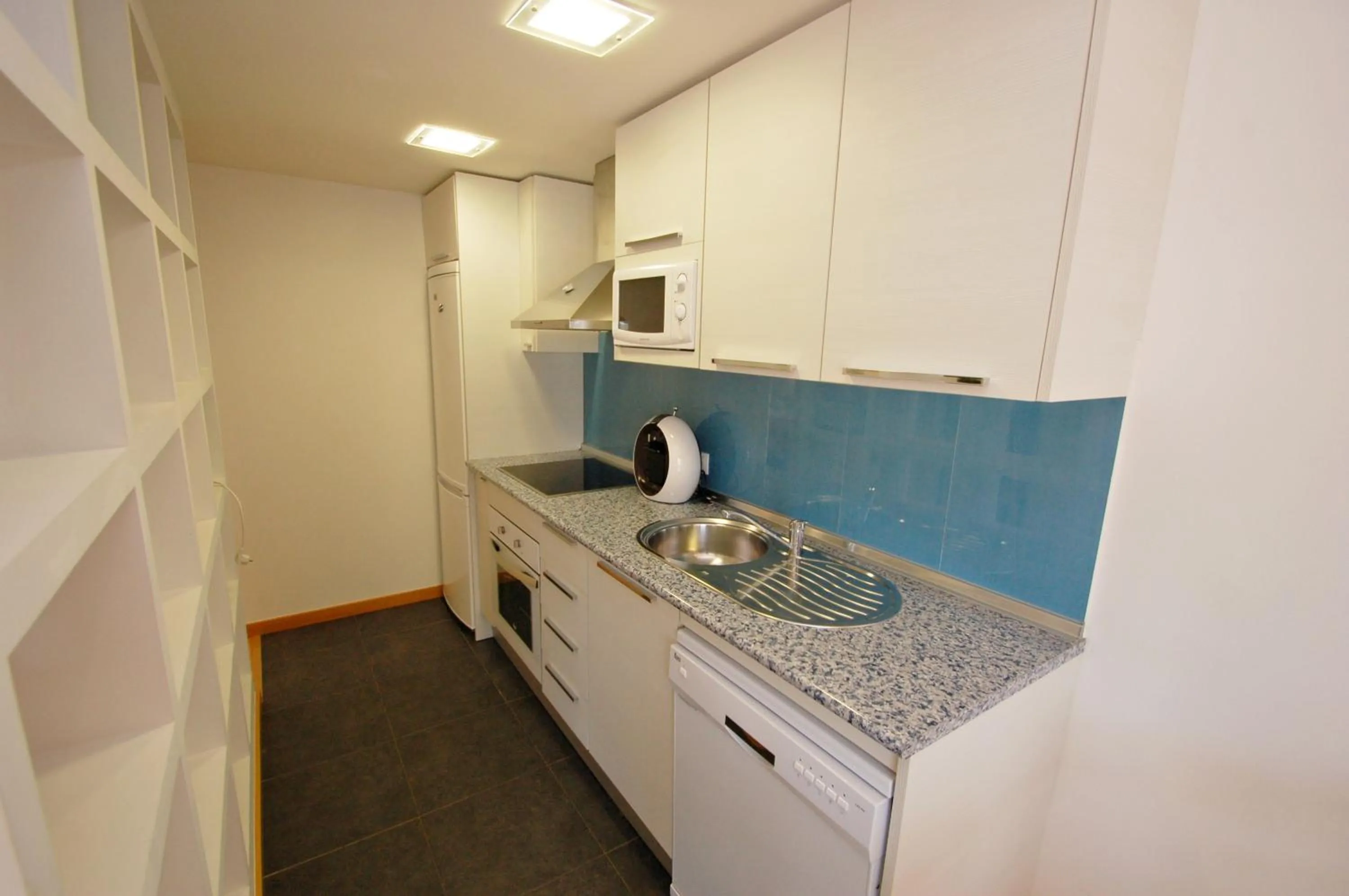 Kitchen or kitchenette in Apartamentos Alborada III