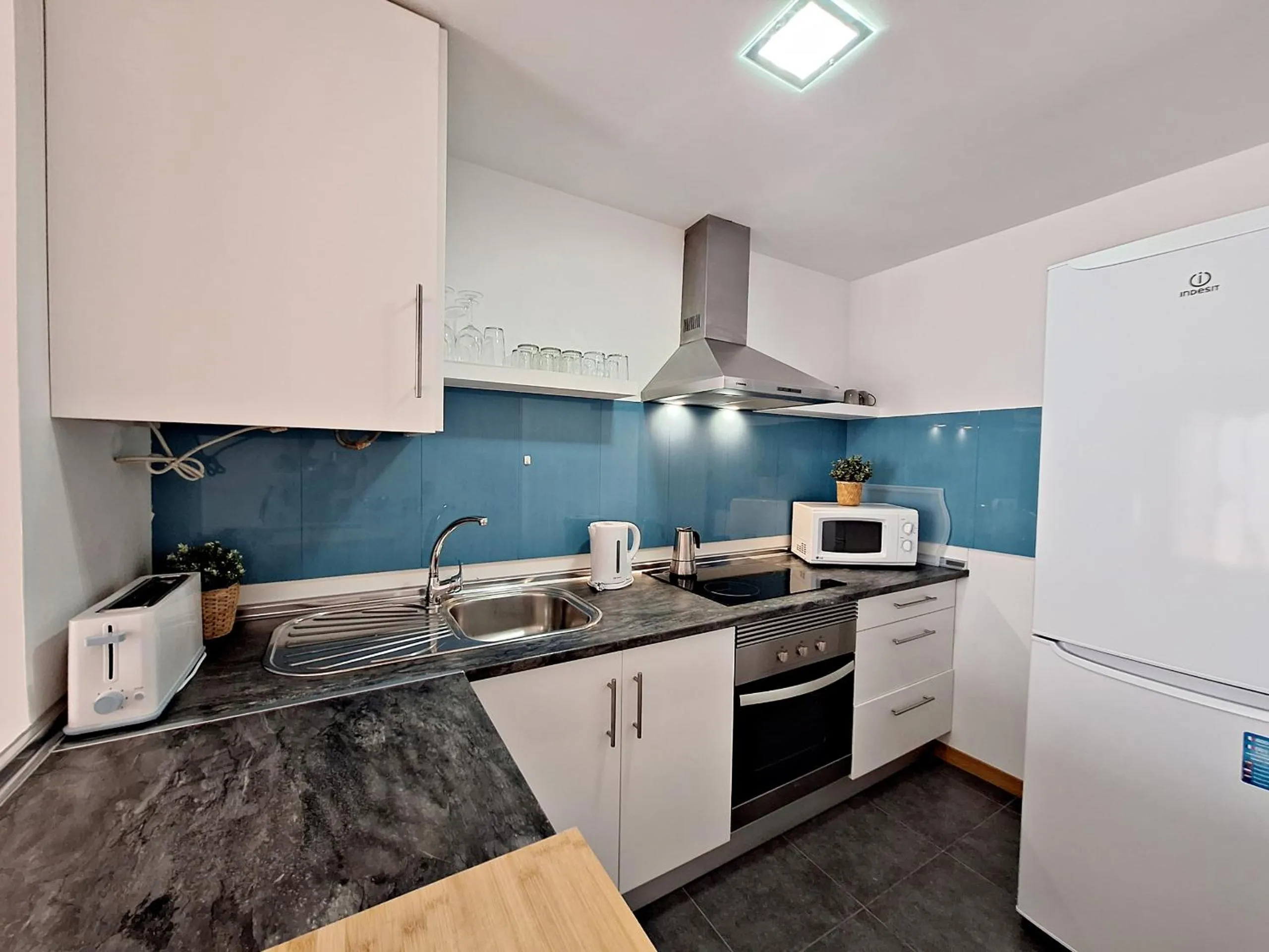 Kitchen or kitchenette in Apartamentos Alborada III