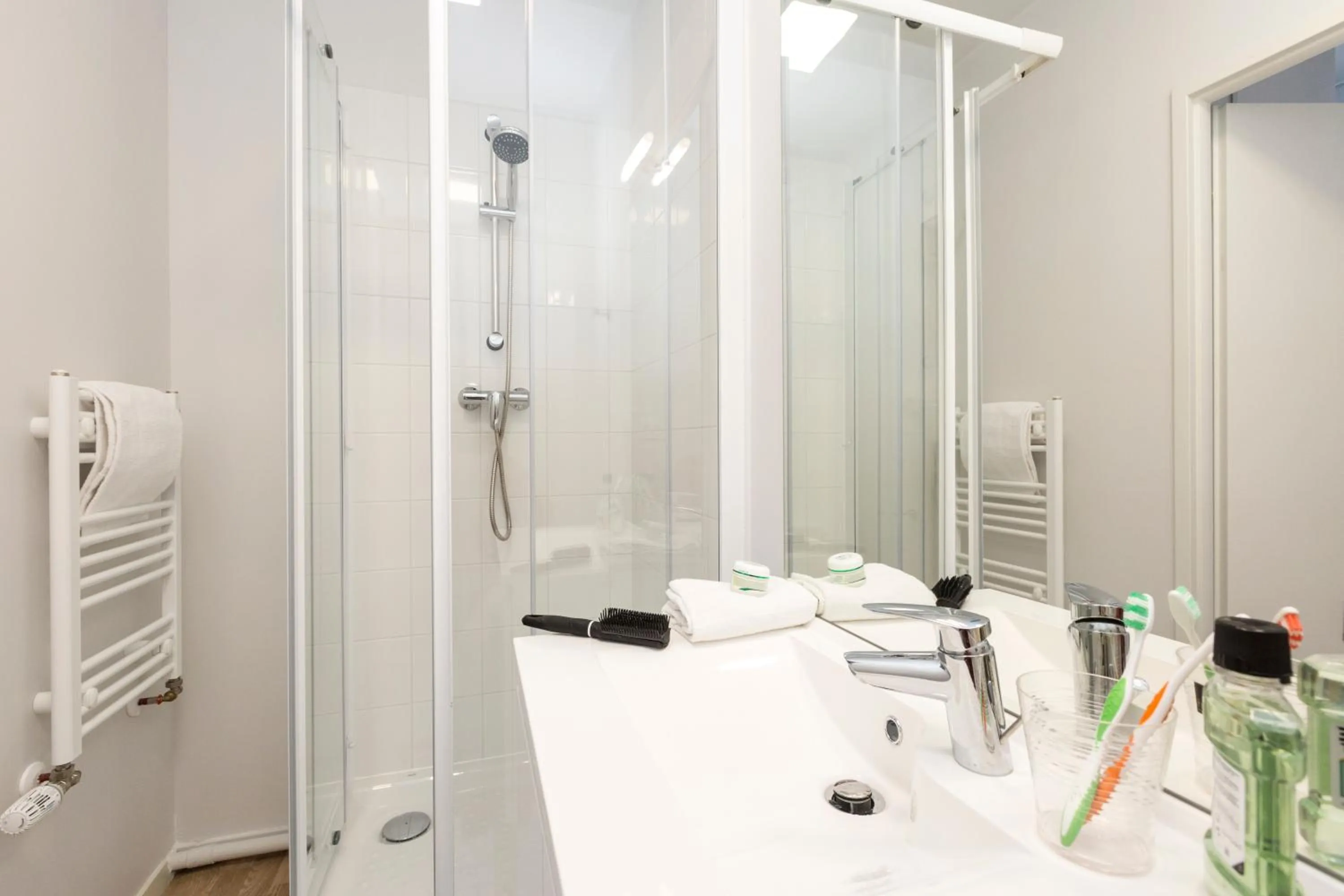 Bathroom in Appart'Hotel Odalys City - Nantes Cité des congrès