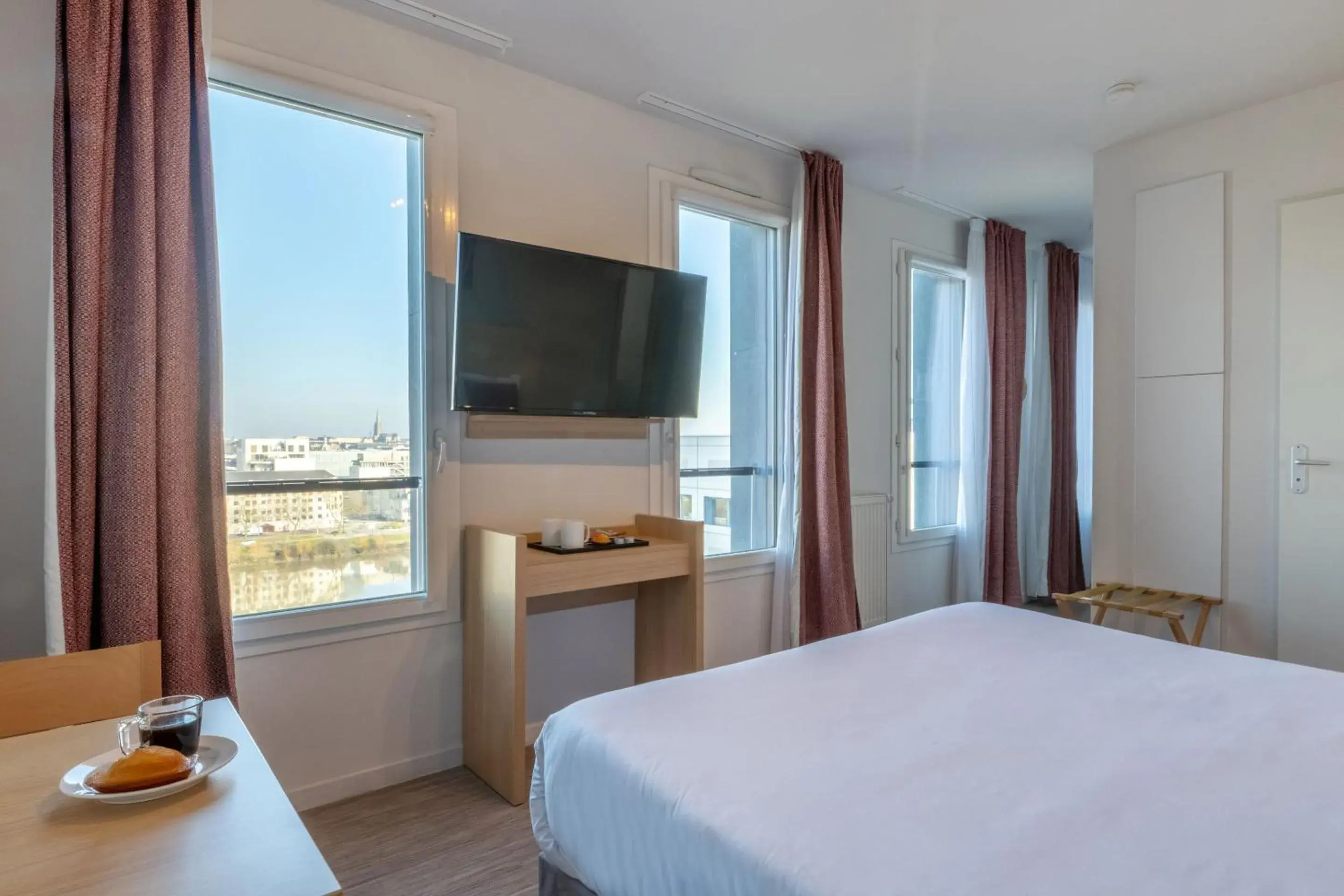 Bedroom, Bed in Appart'Hotel Odalys City - Nantes Cité des congrès Bedroom, Bed in Appart'Hotel Odalys City - Nantes Cité des congrès