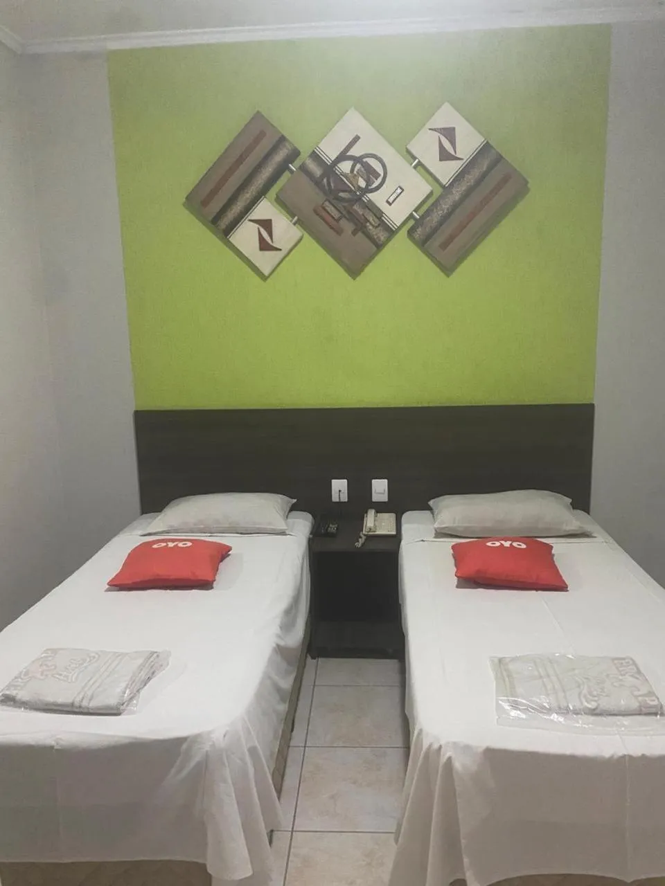 Bed in Center Plaza Hotel