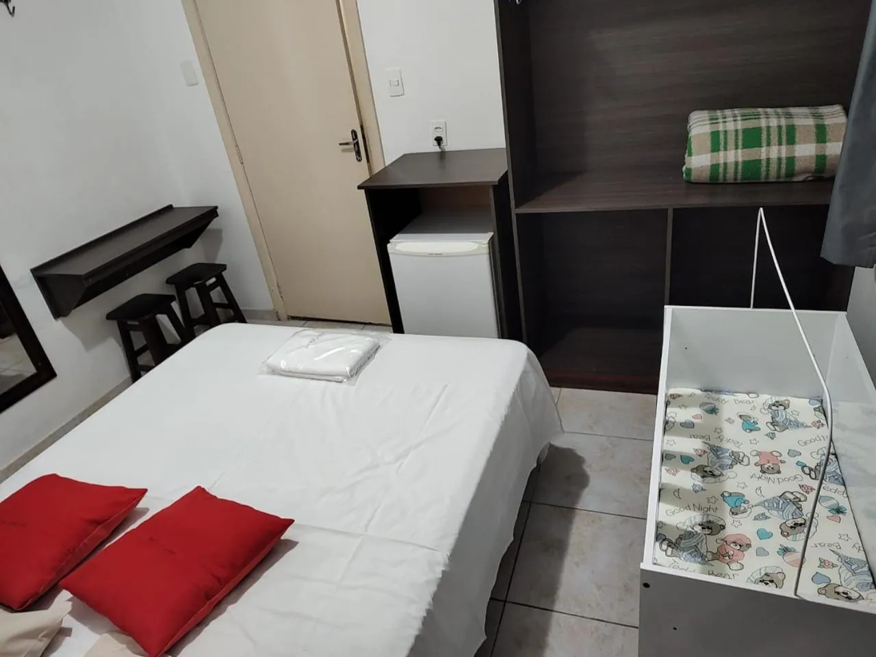 Bed in Center Plaza Hotel