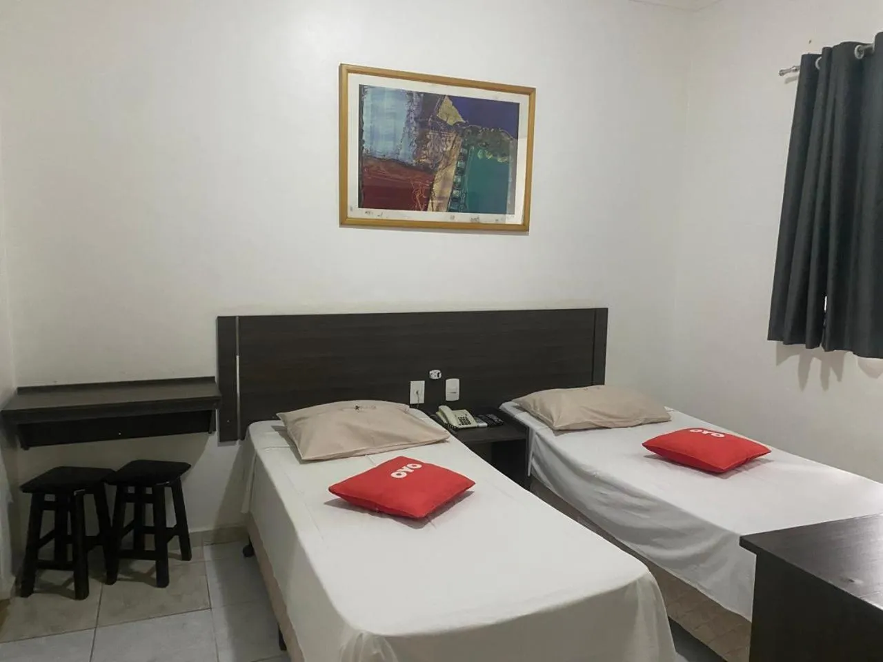 Bed in Center Plaza Hotel