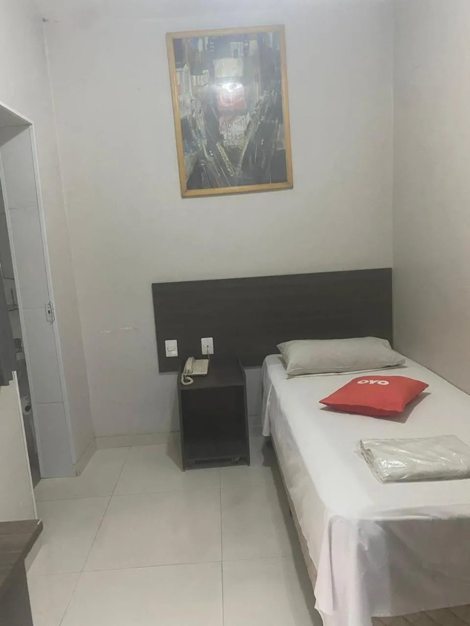 Bed in Center Plaza Hotel