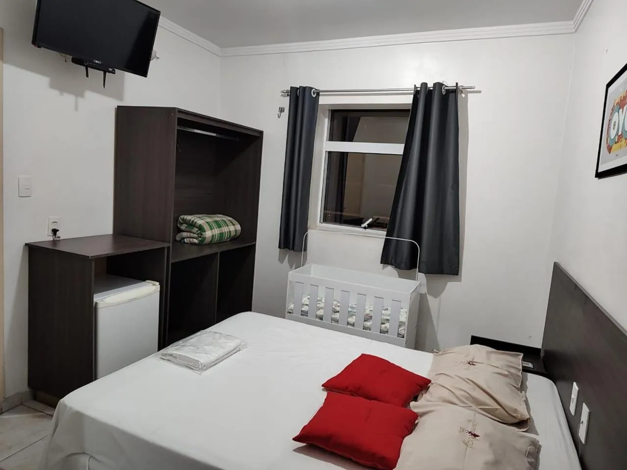 Bed in Center Plaza Hotel