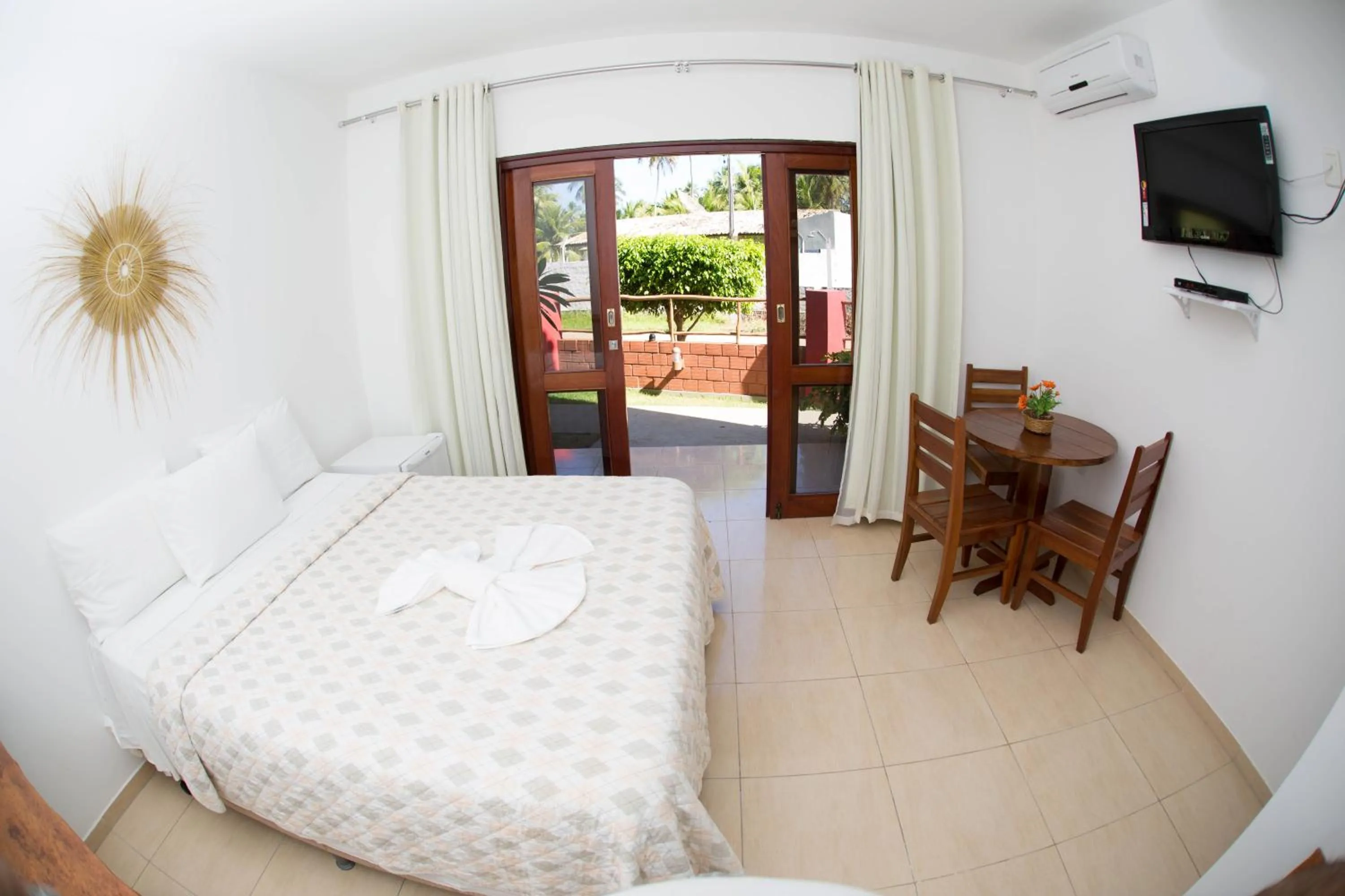 Bed in Pousada Recanto dos Milagres