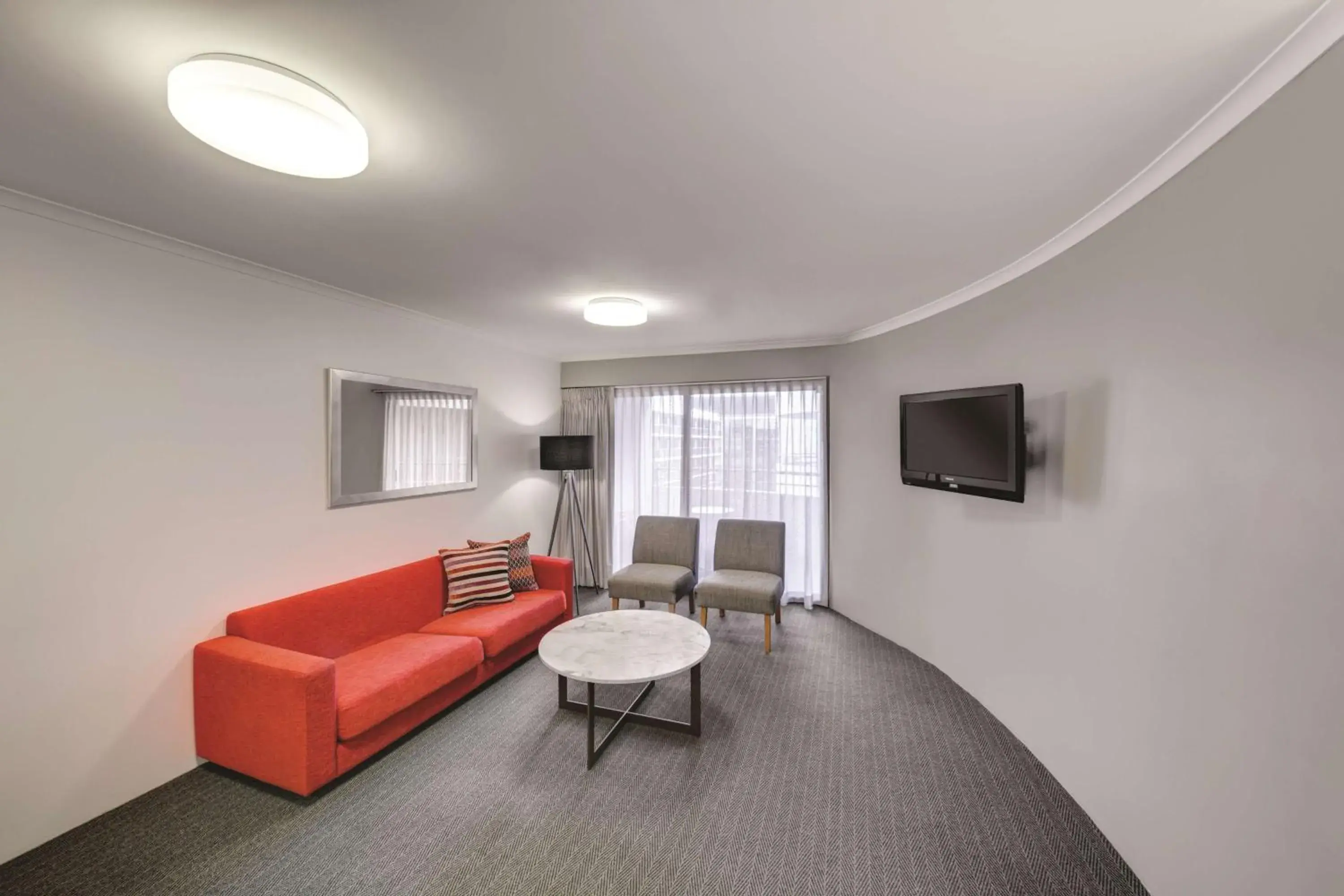 Living room in Adina Serviced Apartments Canberra James Court Living room in Adina Serviced Apartments Canberra James Court