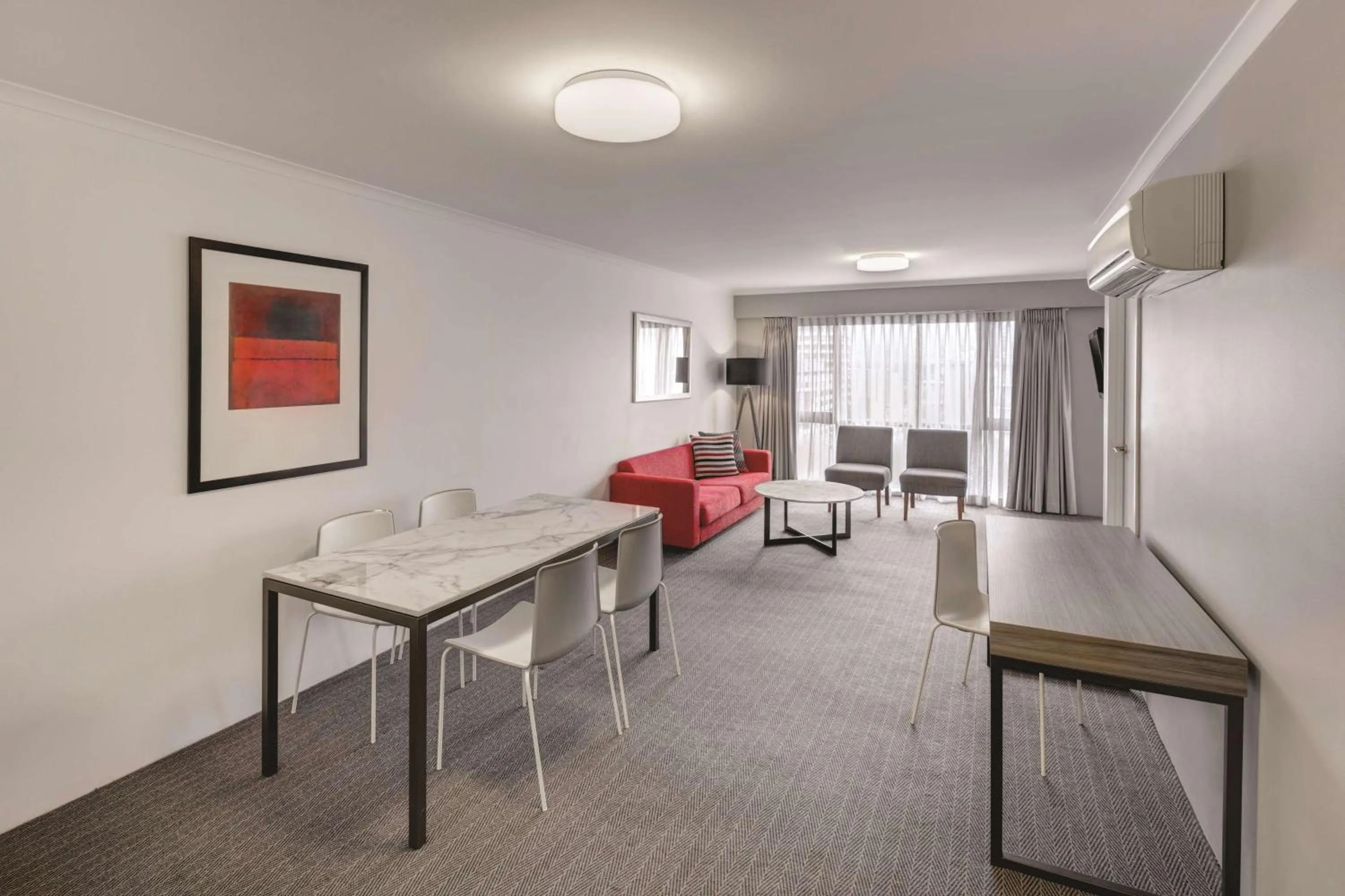 TV and multimedia in Adina Serviced Apartments Canberra James Court