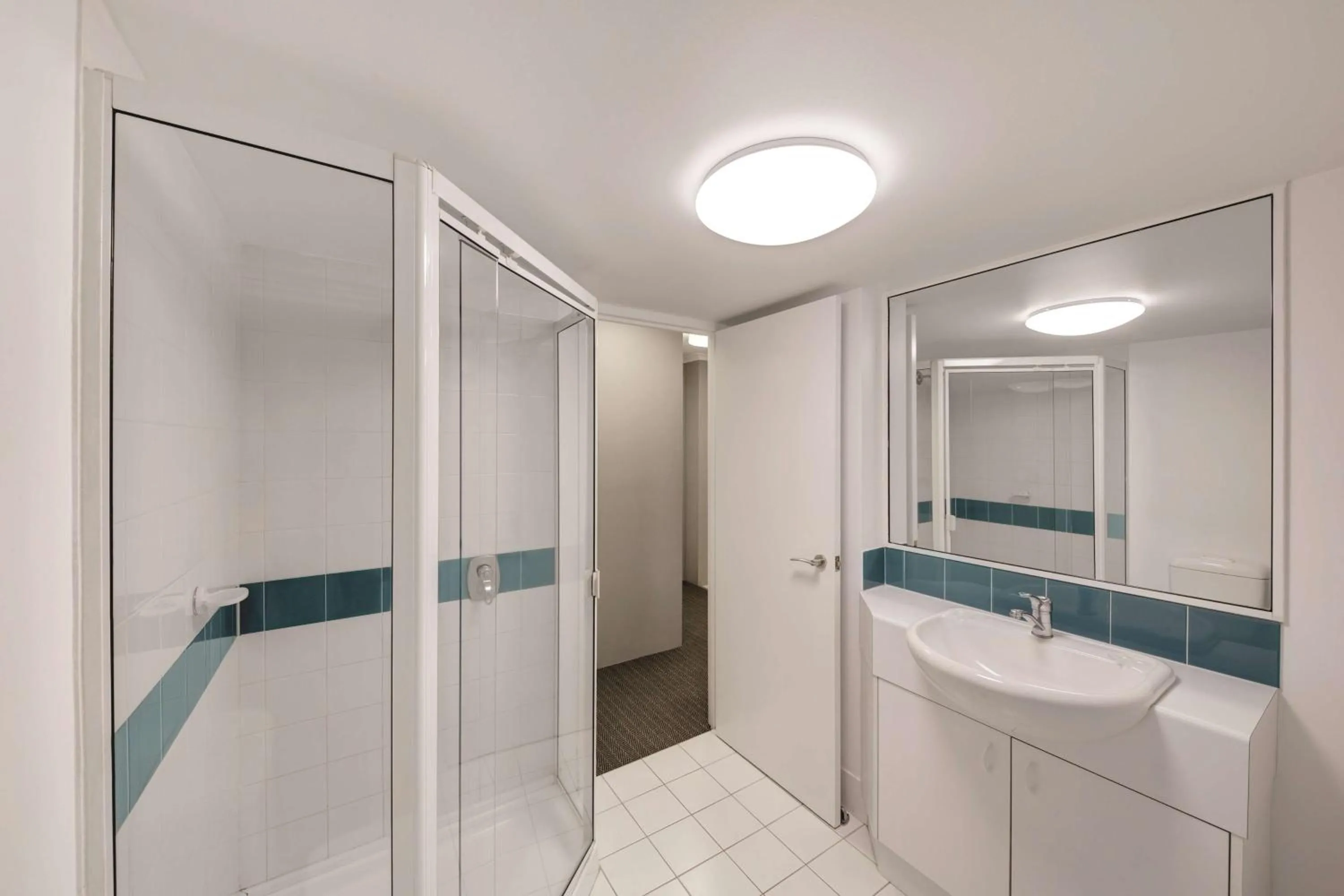Shower in Adina Serviced Apartments Canberra James Court