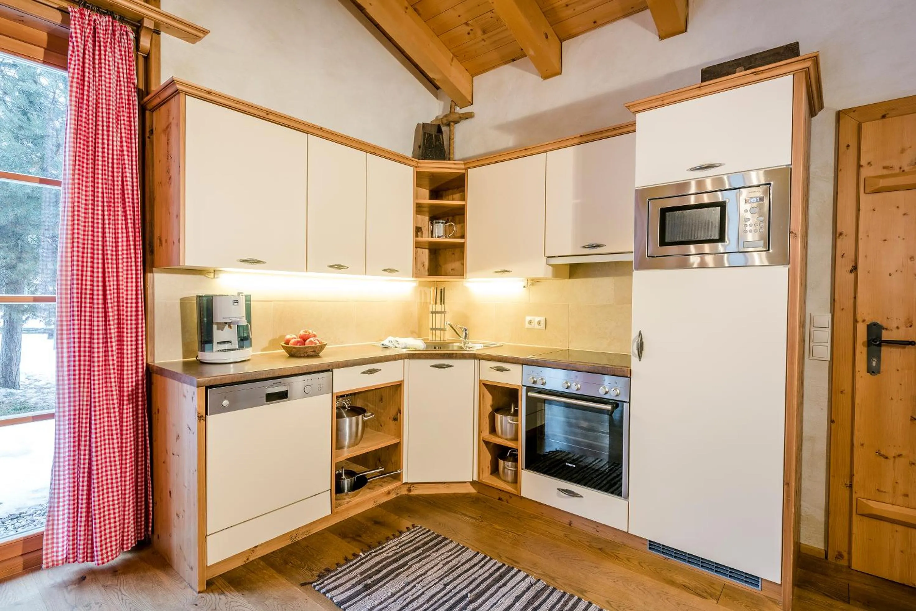 Kitchen or kitchenette in almlust - hotel, apartments, chalets