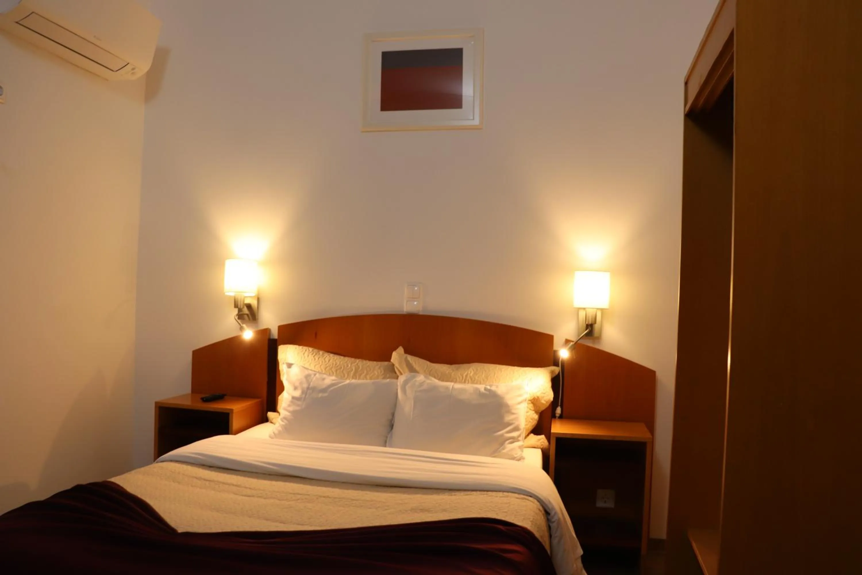 Decorative detail, Bed in Hotel Belém Tejo - Setubalense