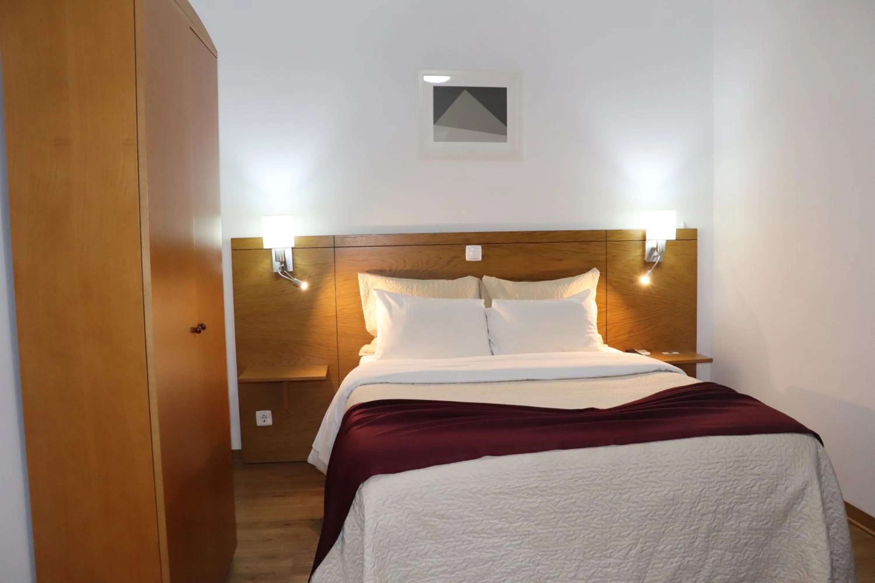 Decorative detail, Bed in Hotel Belém Tejo - Setubalense