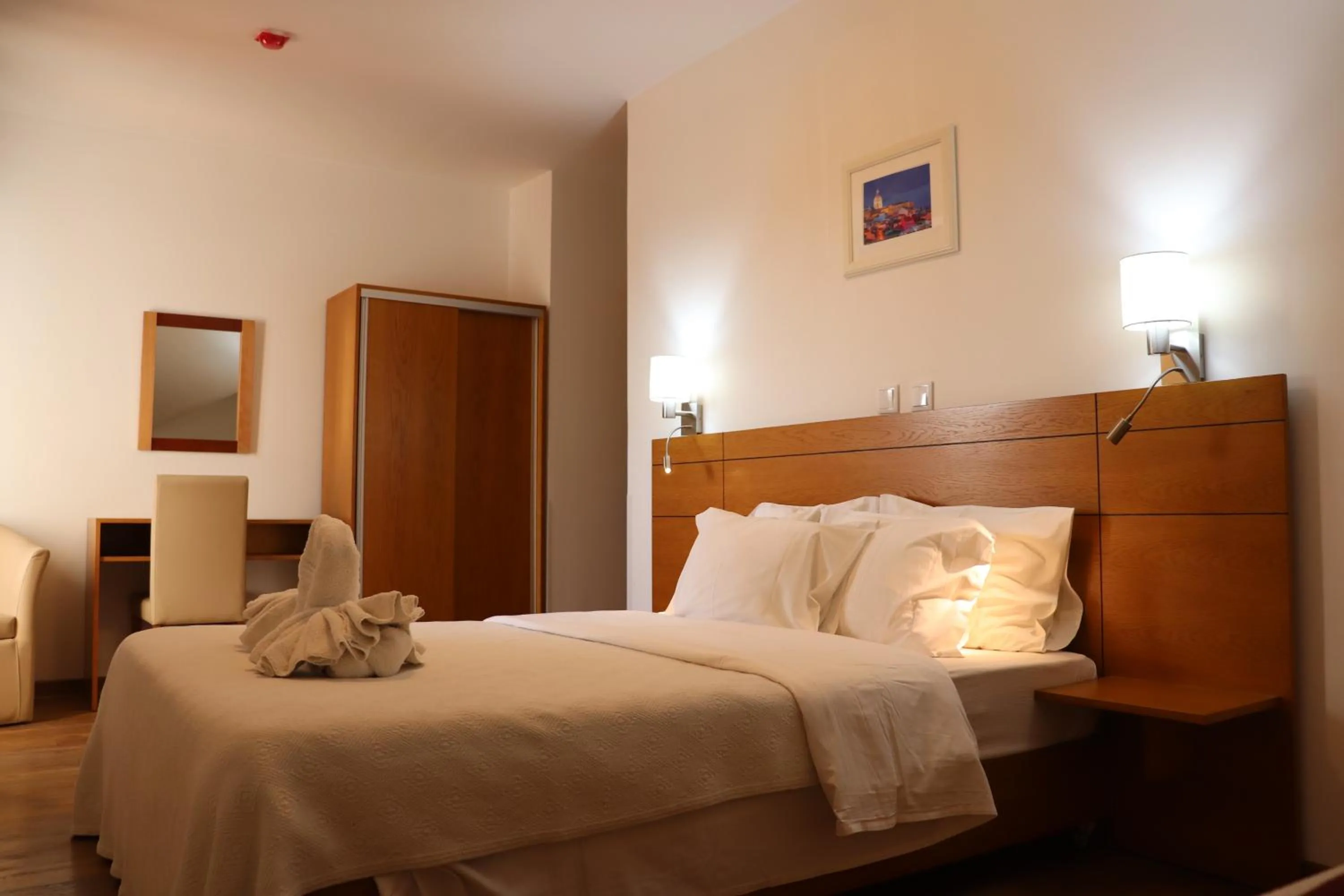 Photo of the whole room, Bed in Hotel Belém Tejo - Setubalense