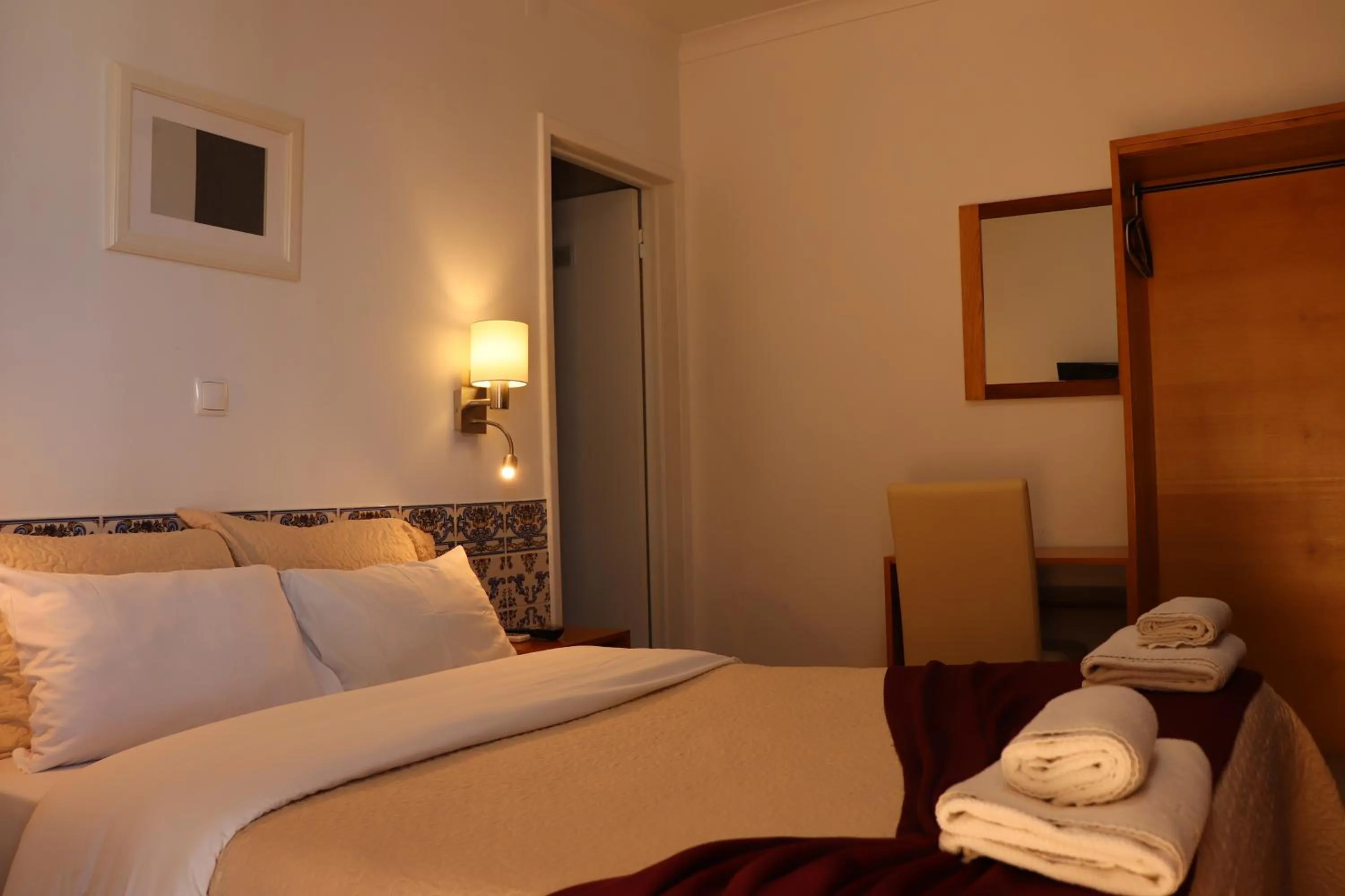 Decorative detail, Bed in Hotel Belém Tejo - Setubalense