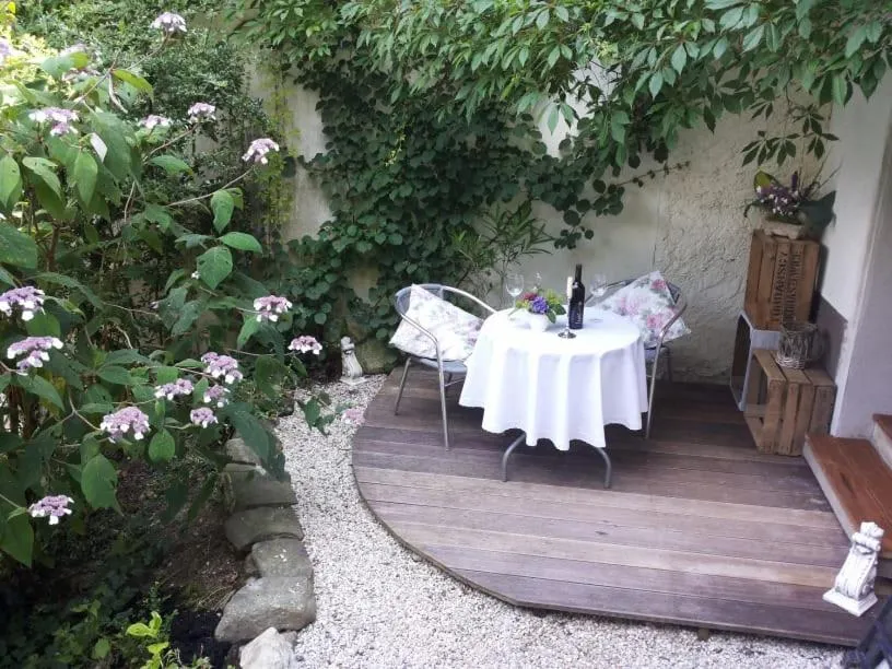 Garden in Gästezimmer Am Hüstert