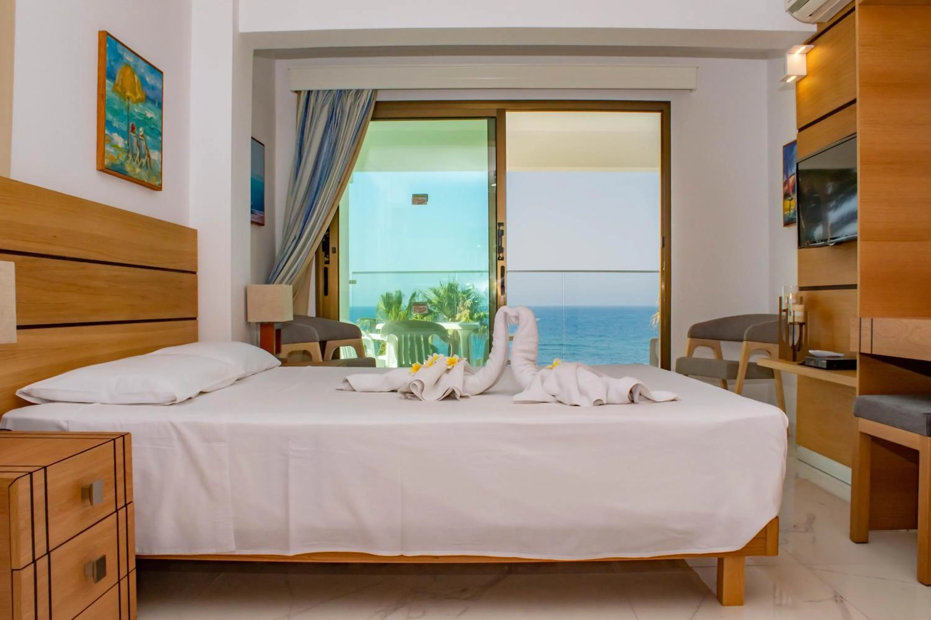 Bed in Rododafni Beach Apartments
