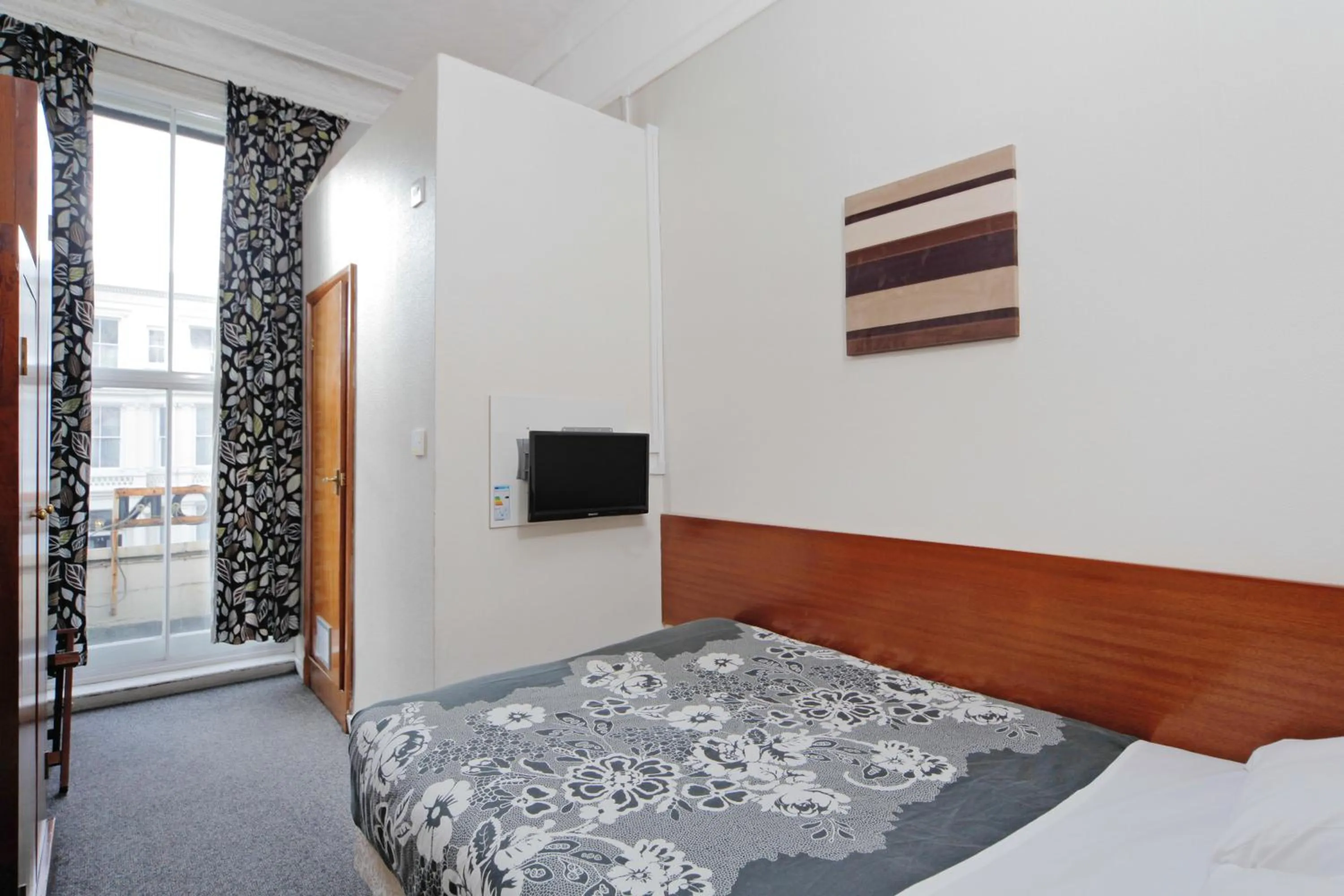 Bed in London Visitors Hotel