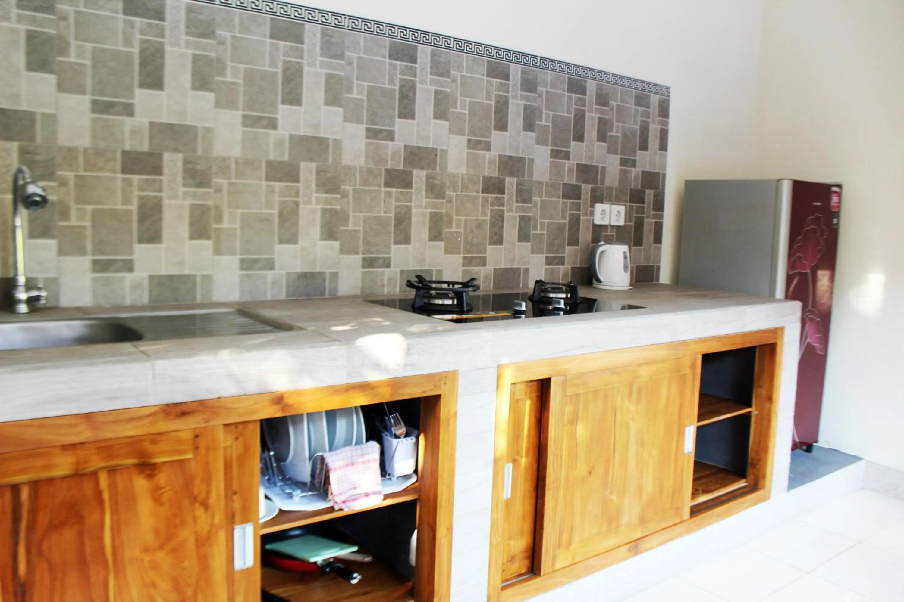 Kitchen or kitchenette in Balimas Guest House