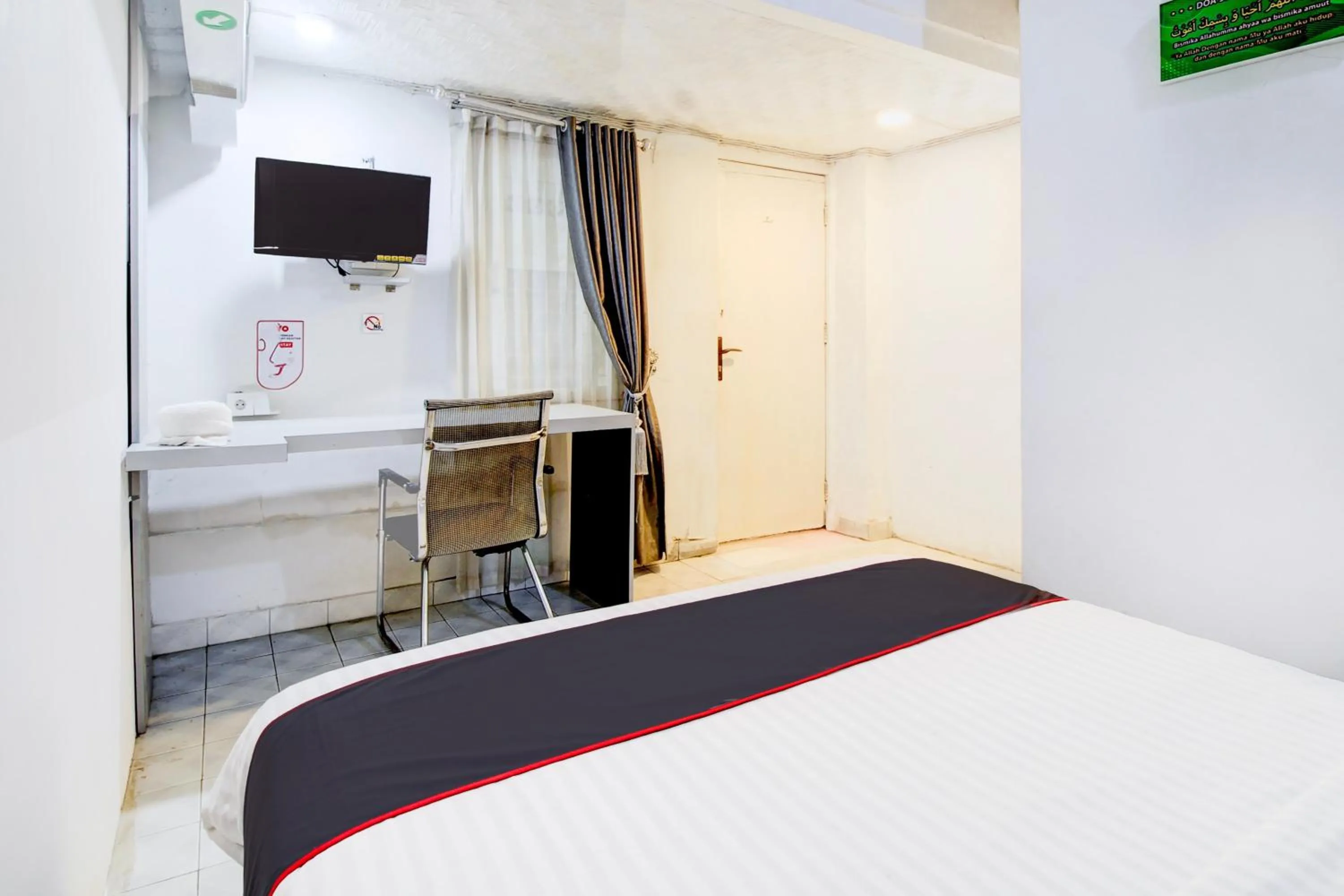 Bedroom, Bed in Hotel O Jalan Jenderal Sudirman Near Imam Bonjol Square Formerly Nelvi Guest House