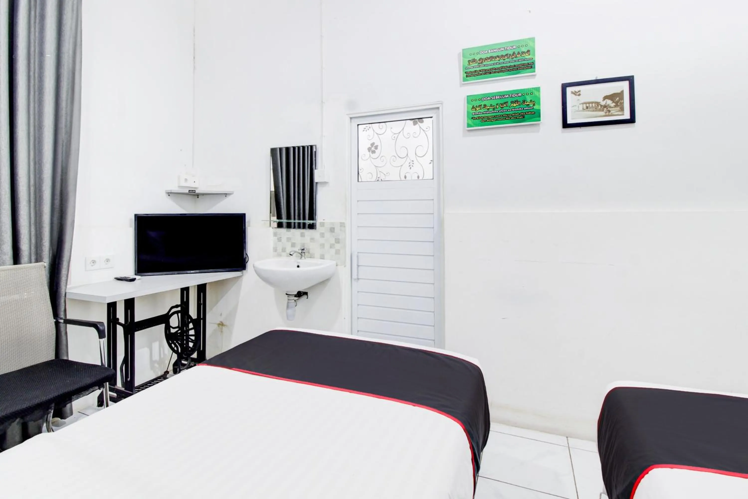 Bedroom, Bed in Hotel O Jalan Jenderal Sudirman Near Imam Bonjol Square Formerly Nelvi Guest House