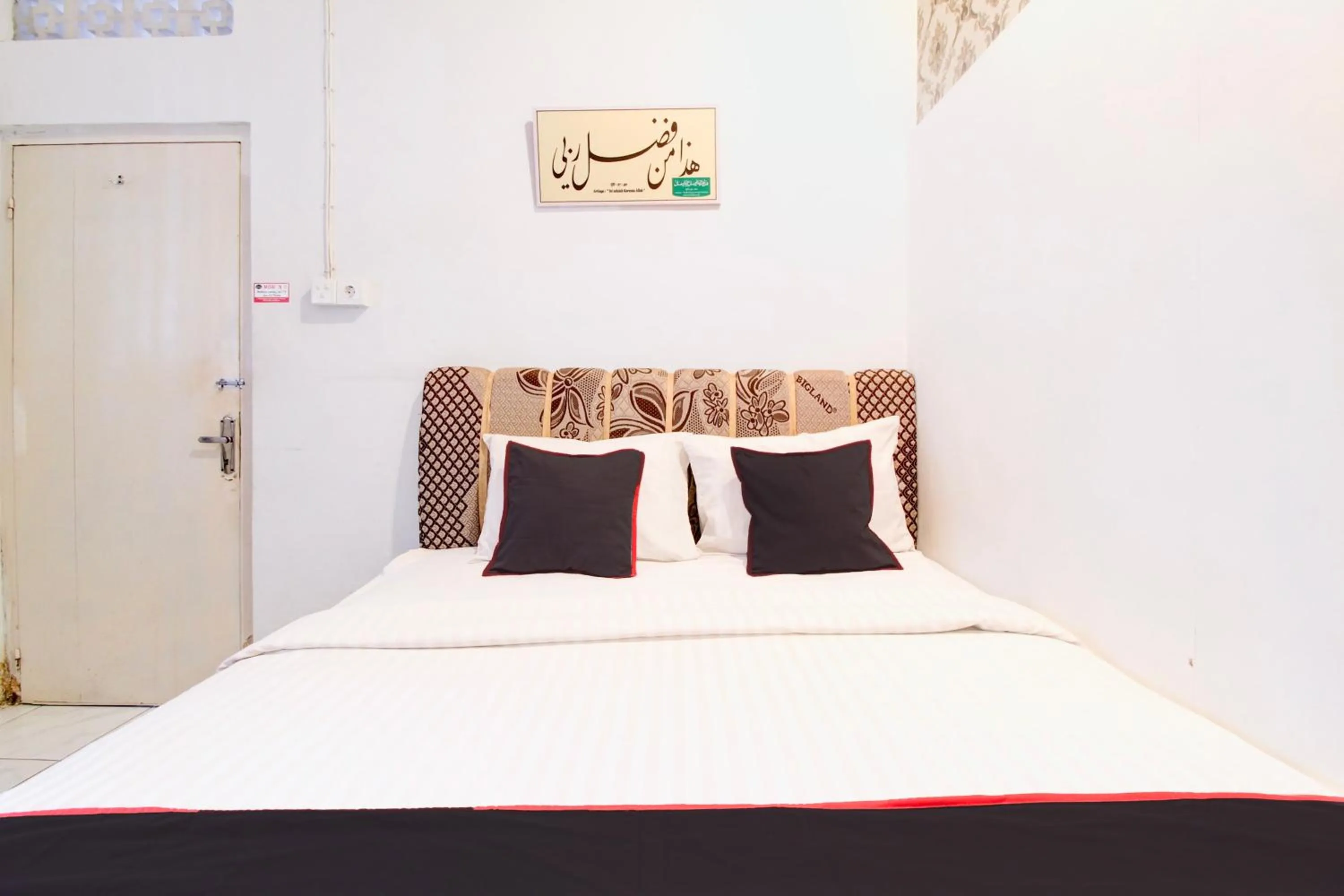 Bedroom, Bed in Hotel O Jalan Jenderal Sudirman Near Imam Bonjol Square Formerly Nelvi Guest House