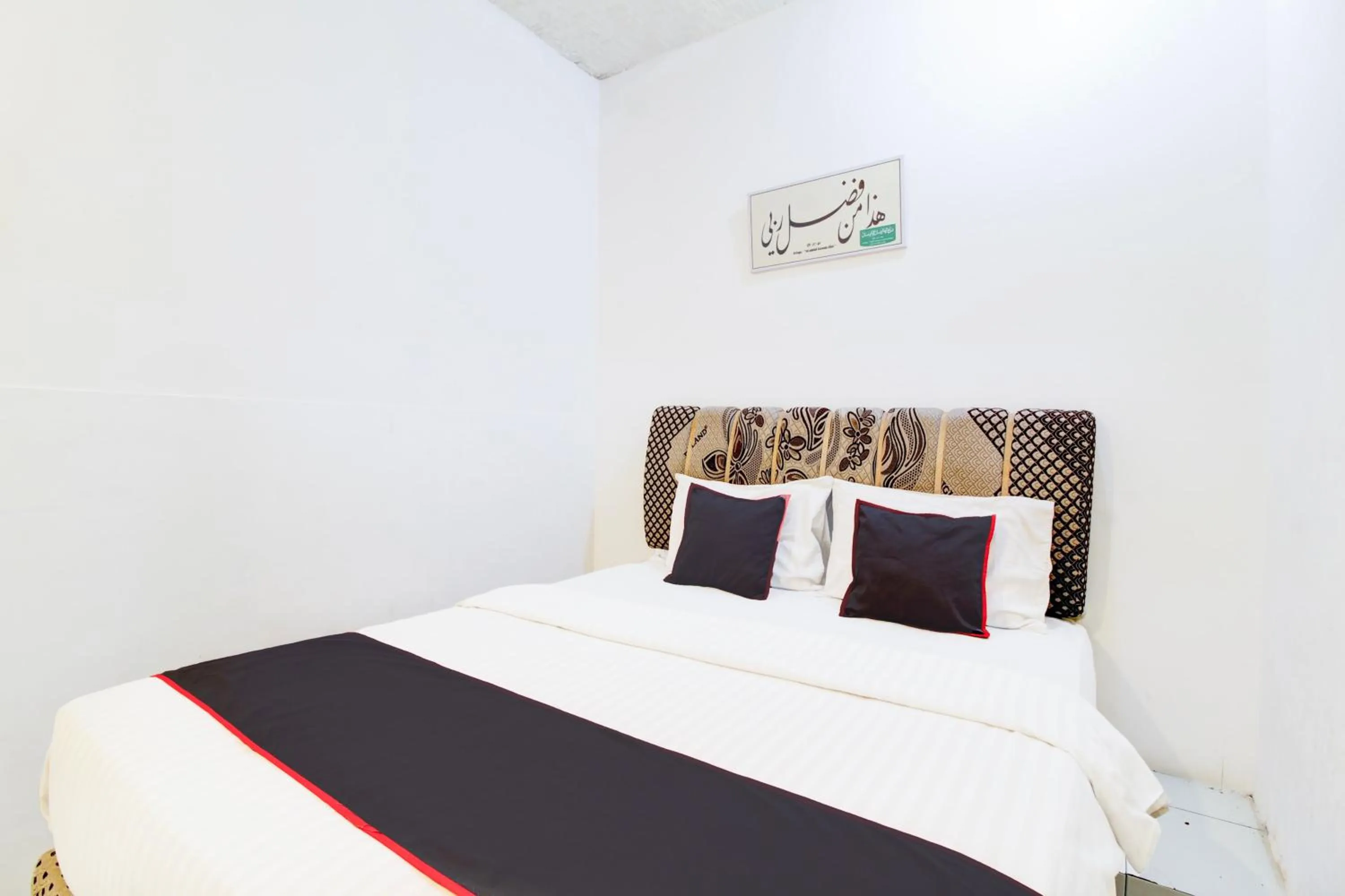 Bedroom, Bed in Hotel O Jalan Jenderal Sudirman Near Imam Bonjol Square Formerly Nelvi Guest House