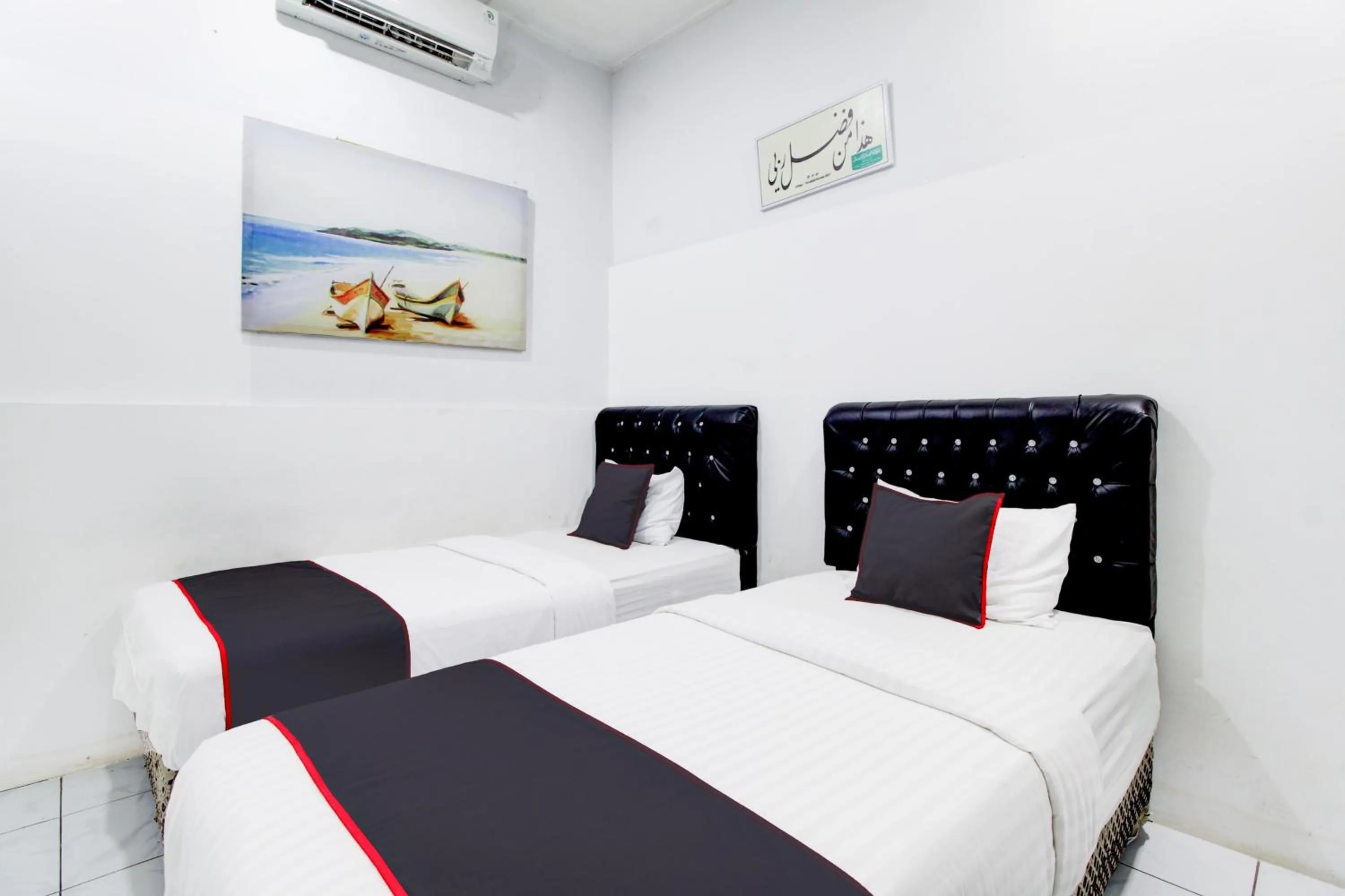 Bedroom, Bed in Hotel O Jalan Jenderal Sudirman Near Imam Bonjol Square Formerly Nelvi Guest House