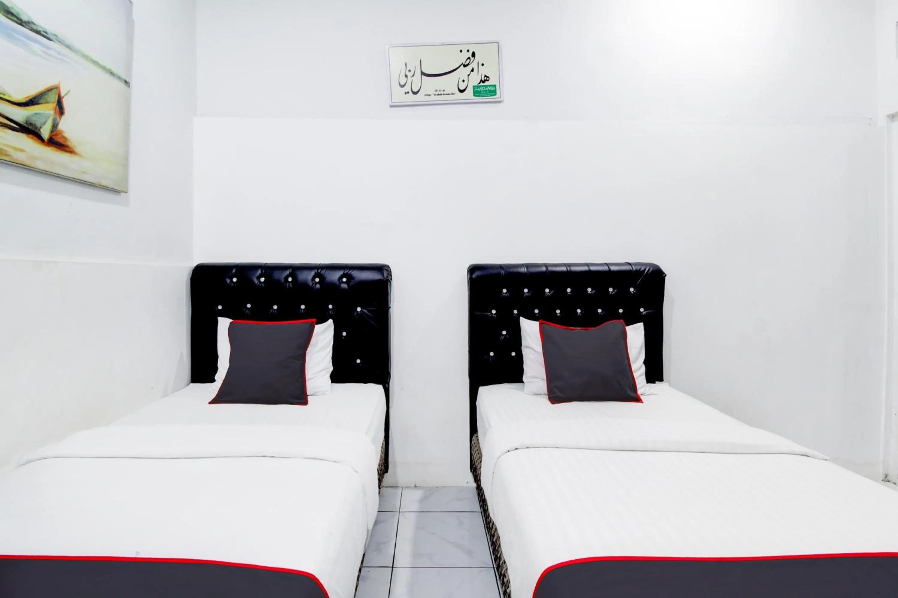 Bedroom, Bed in Hotel O Jalan Jenderal Sudirman Near Imam Bonjol Square Formerly Nelvi Guest House