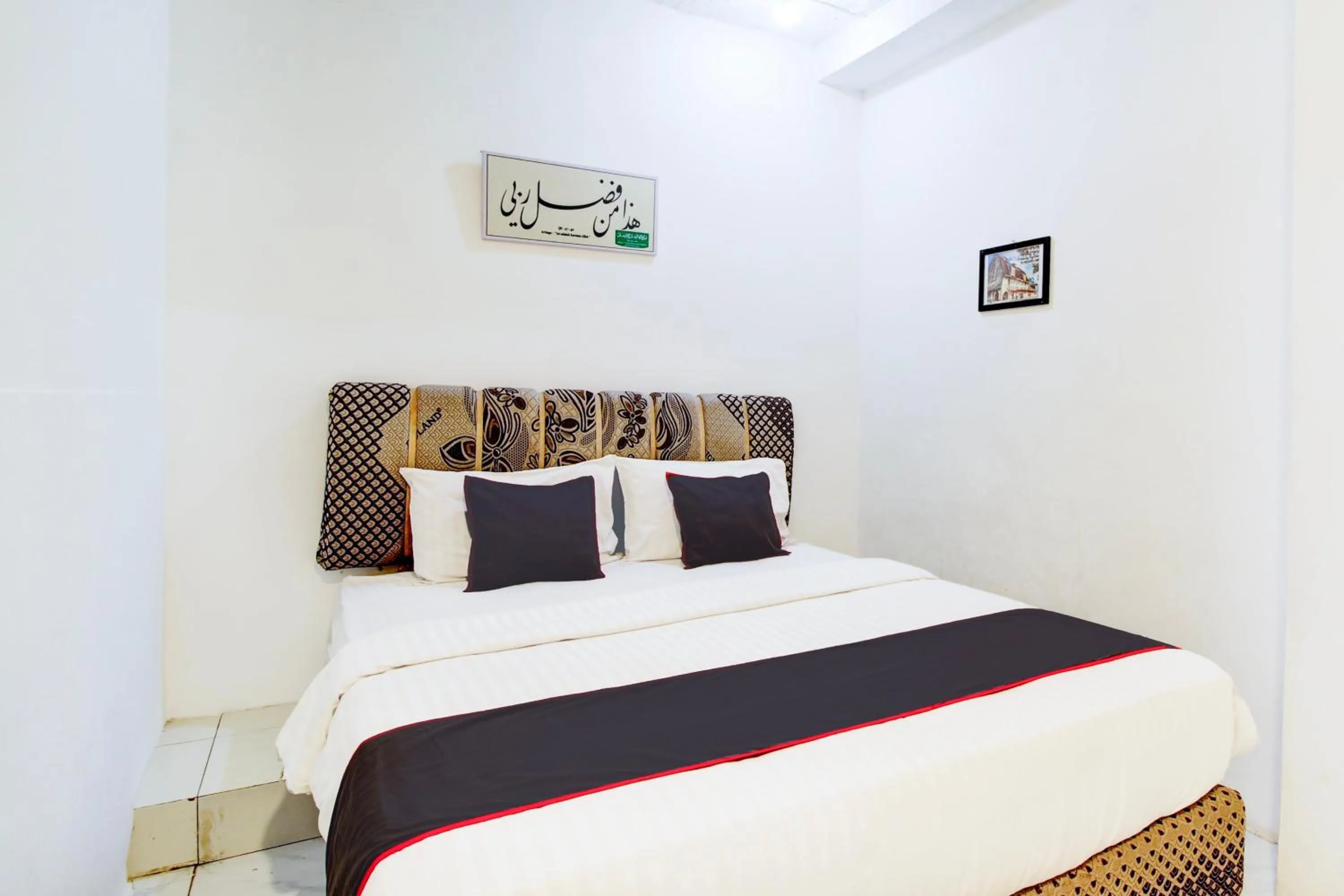 Bedroom, Bed in Hotel O Jalan Jenderal Sudirman Near Imam Bonjol Square Formerly Nelvi Guest House
