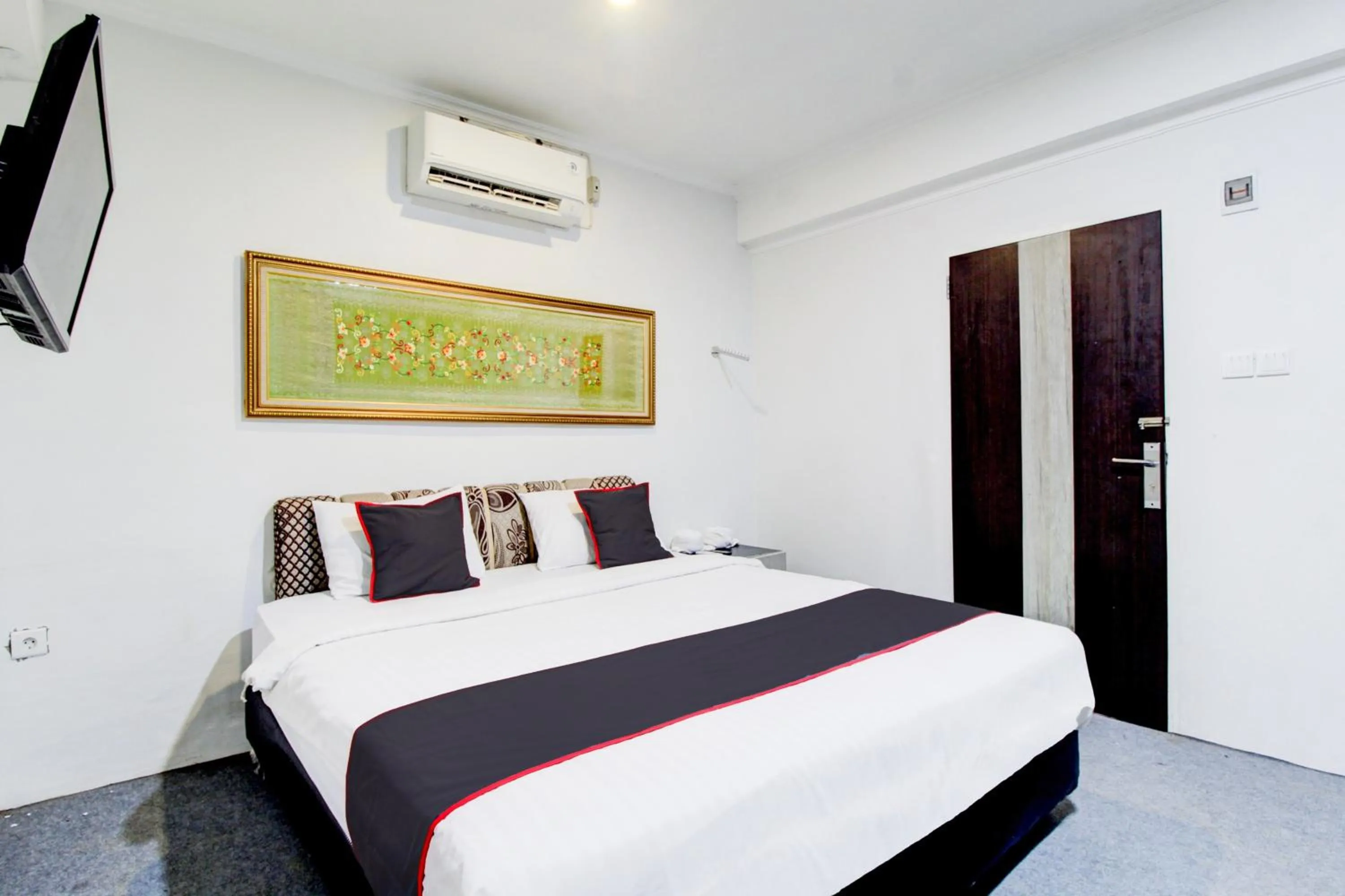Bedroom, Bed in Hotel O Jalan Jenderal Sudirman Near Imam Bonjol Square Formerly Nelvi Guest House