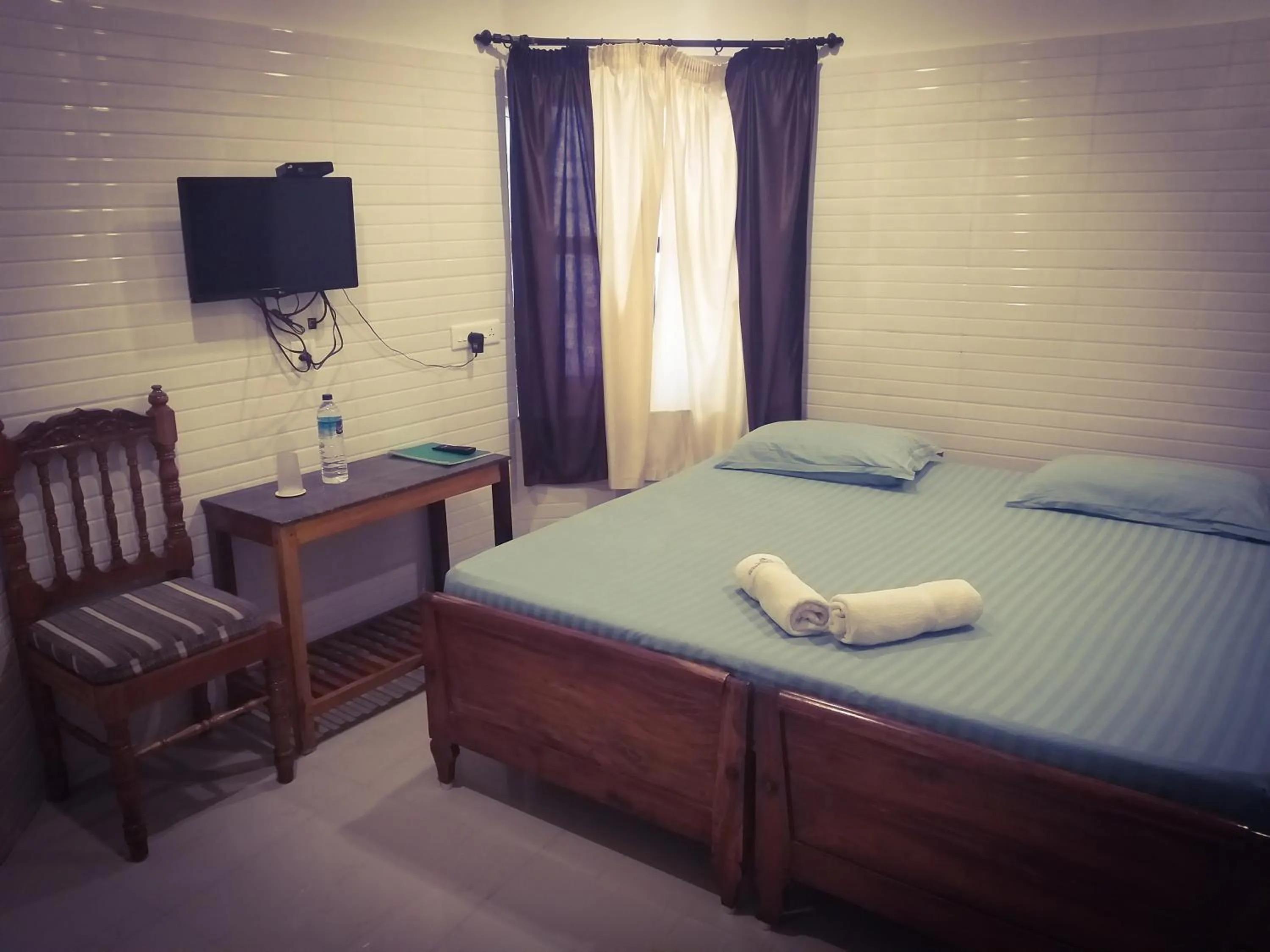 Bed in Hotel Jebasakthy