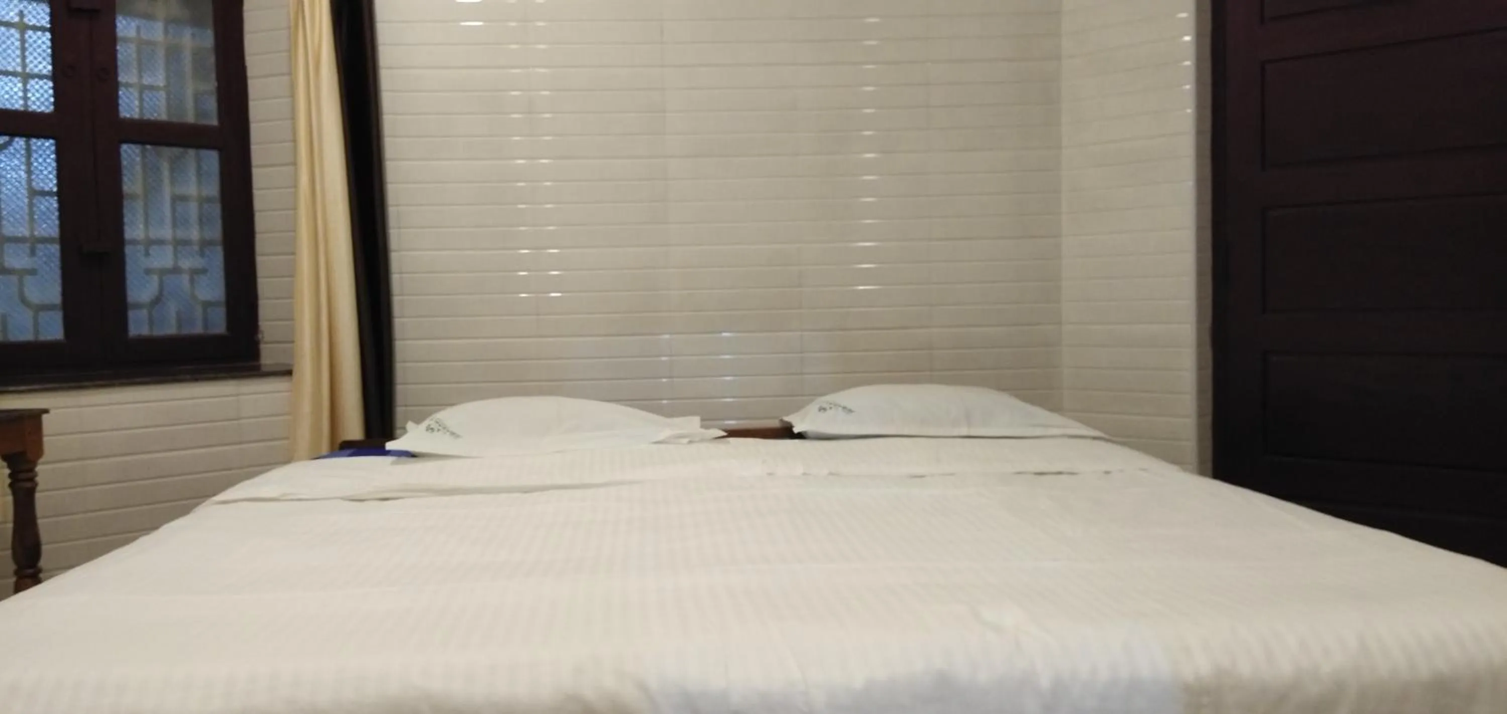 Bed in Hotel Jebasakthy