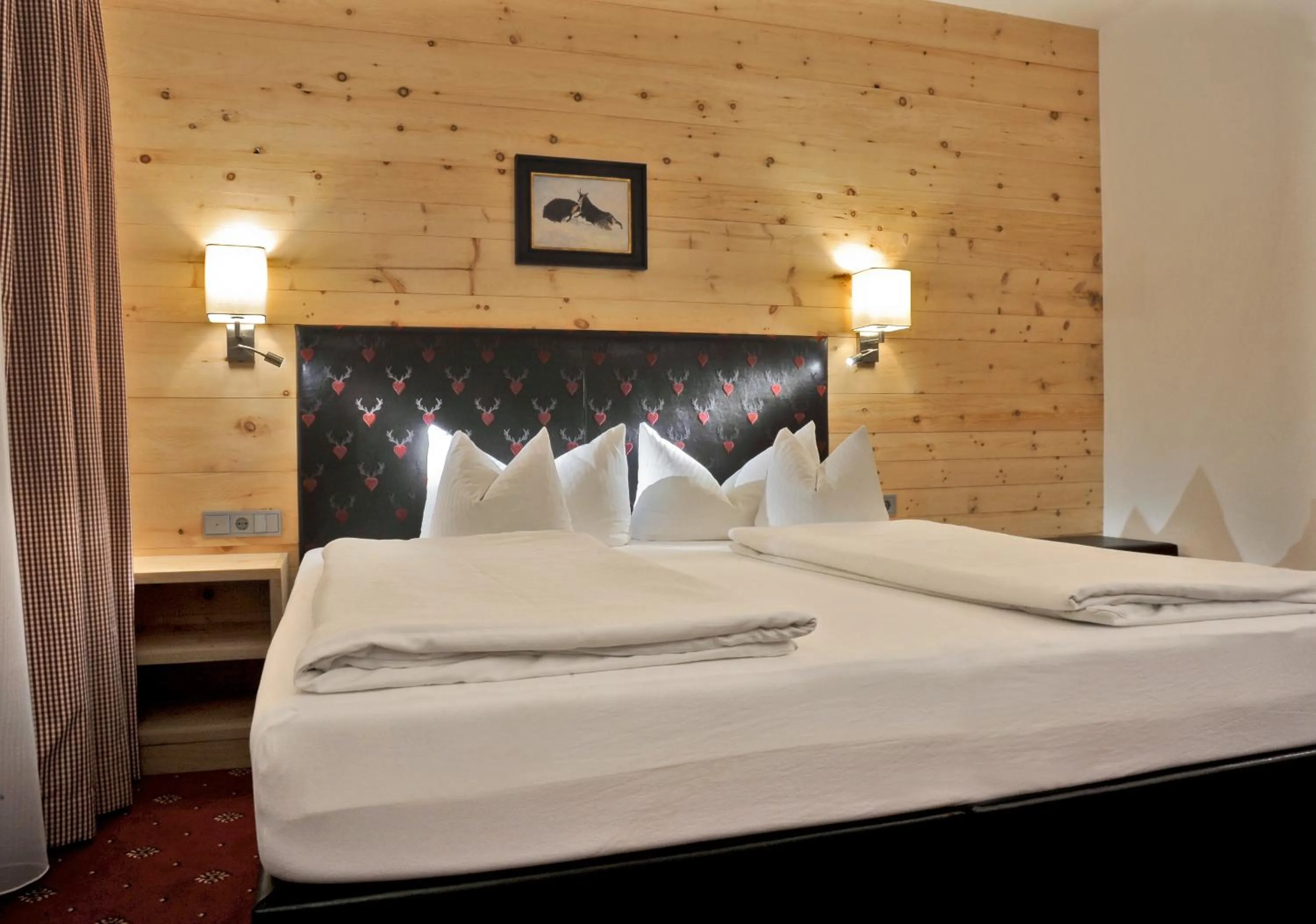 Bed in Hotel Tipotsch