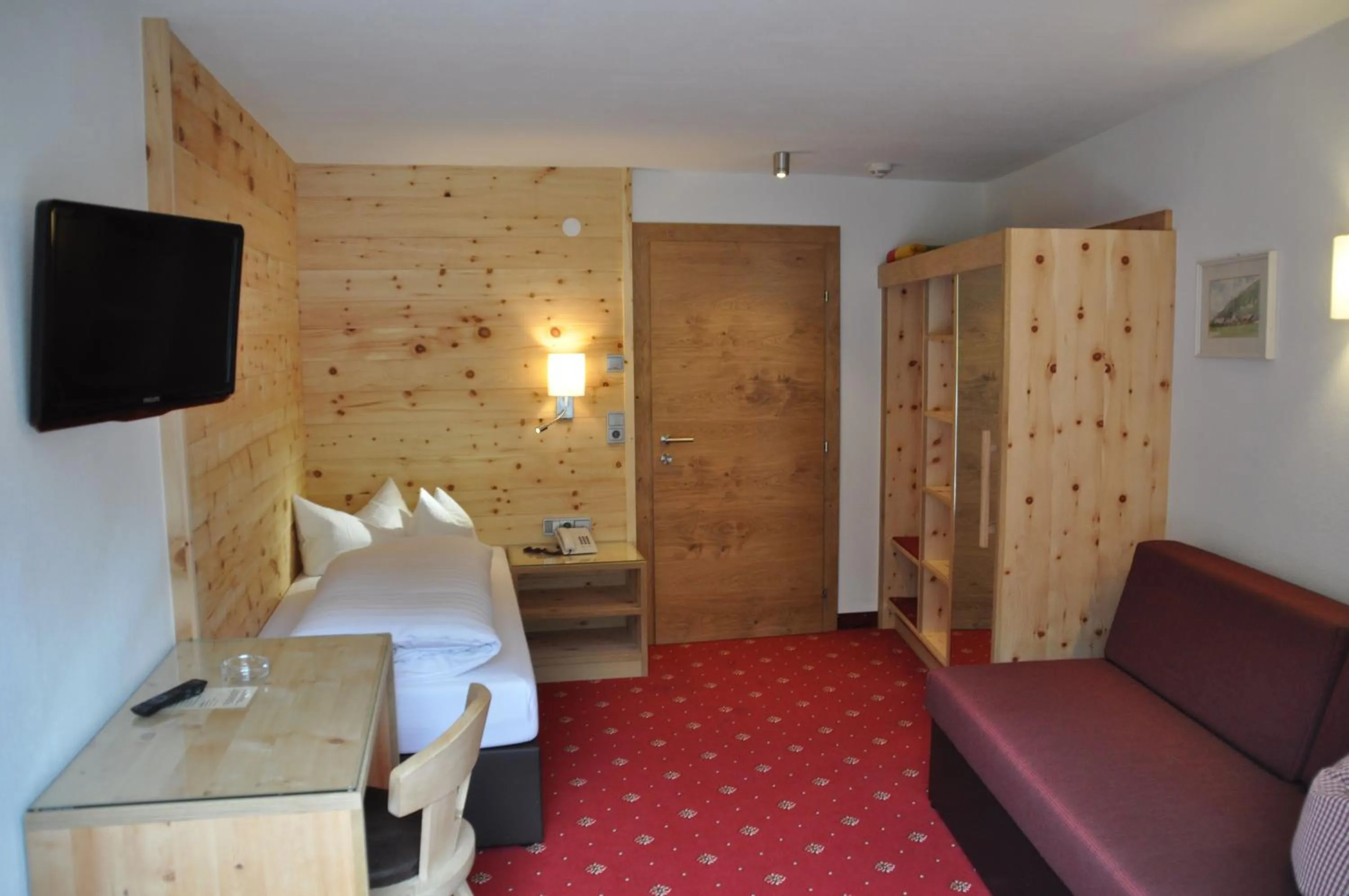 Bed in Hotel Tipotsch