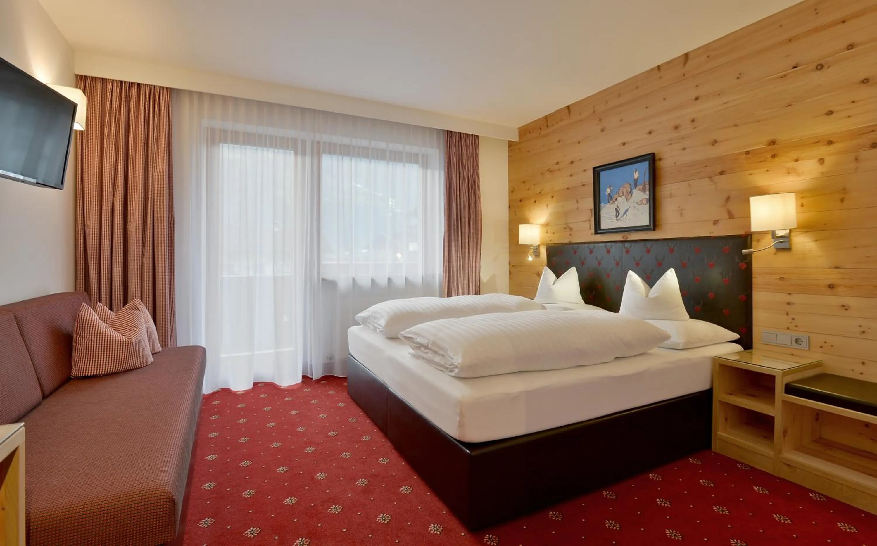 Bed in Hotel Tipotsch