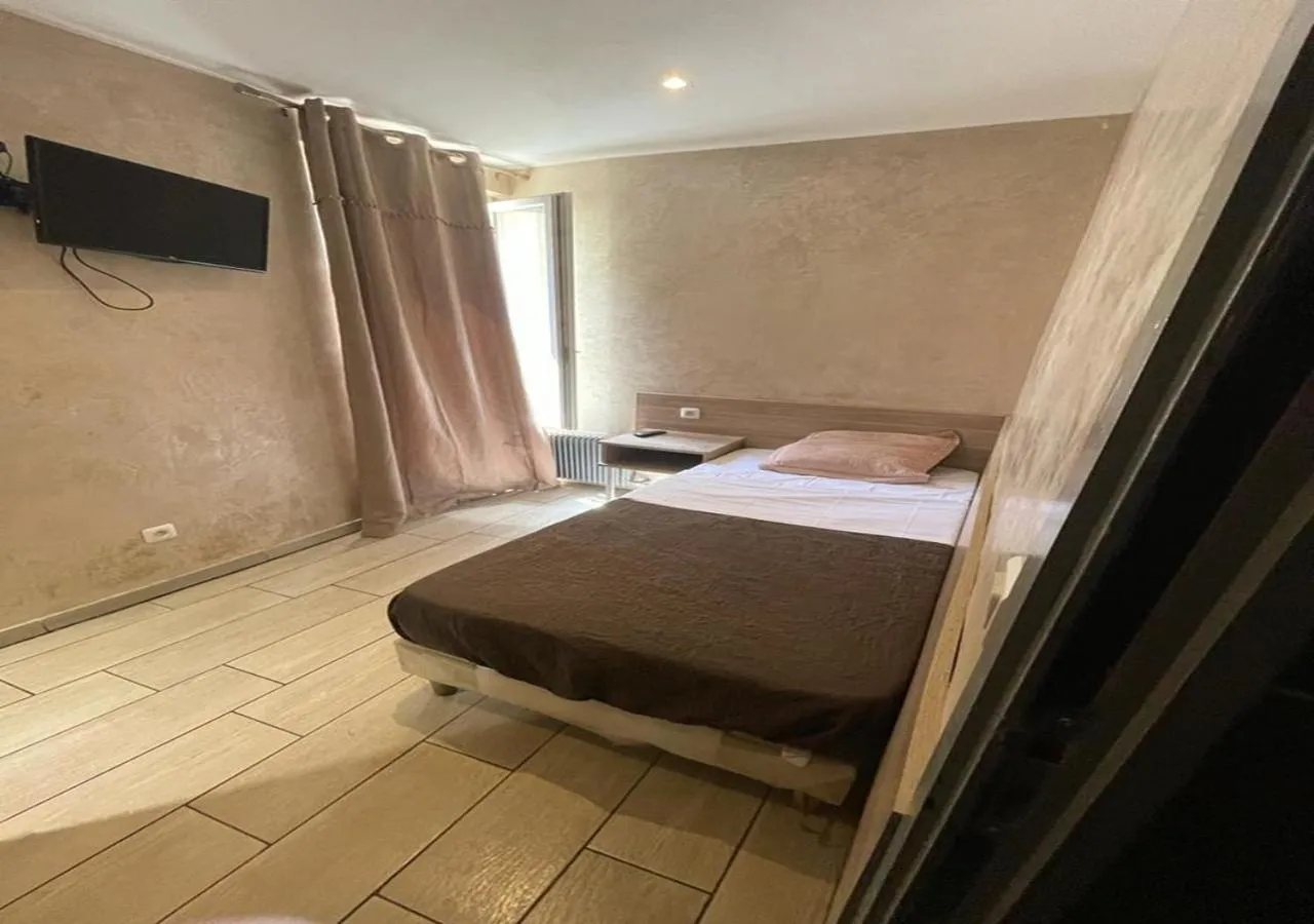 Bed in LPL Paris Hotel