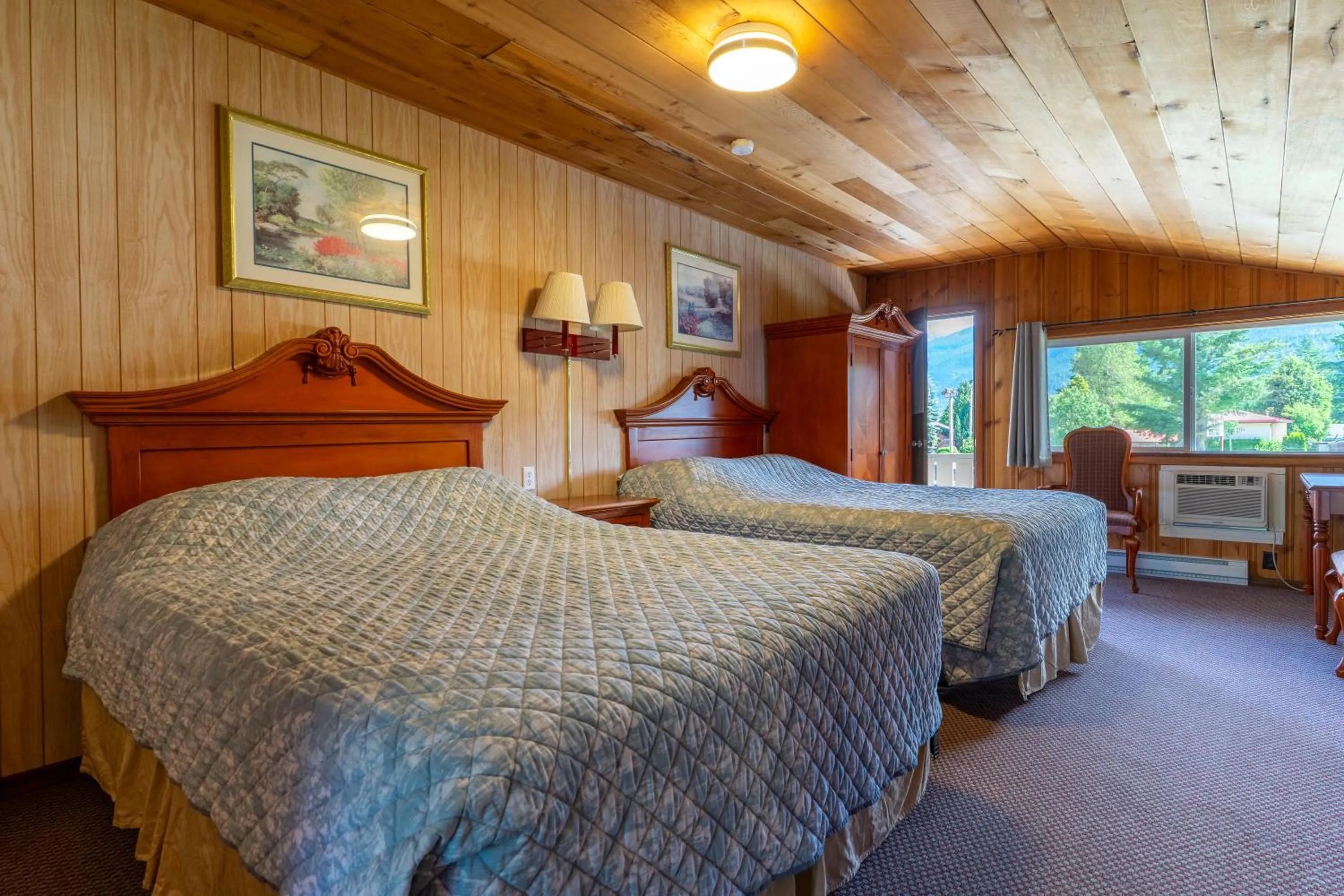 Bed in Richca Chalets Resort