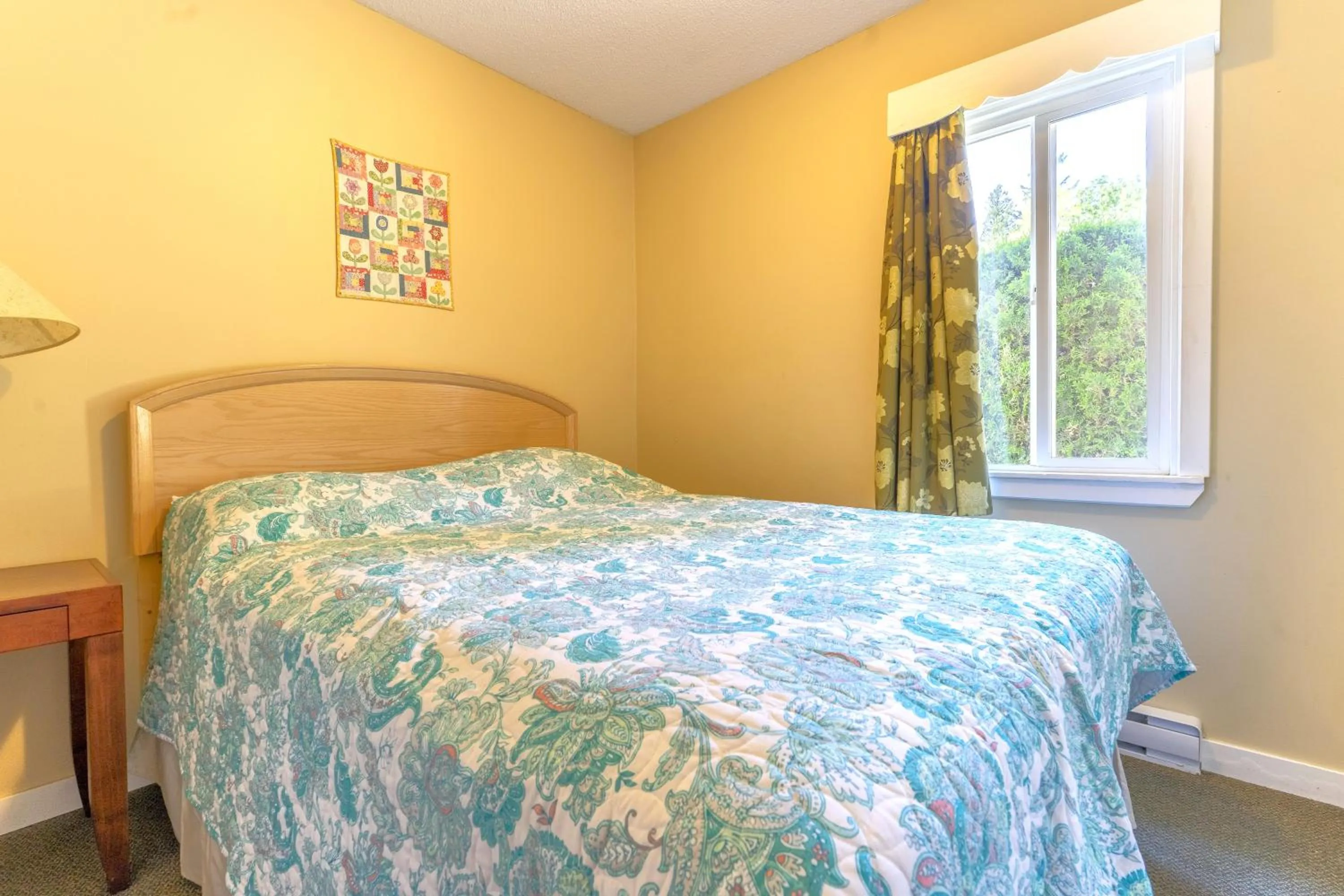 Bed in Richca Chalets Resort