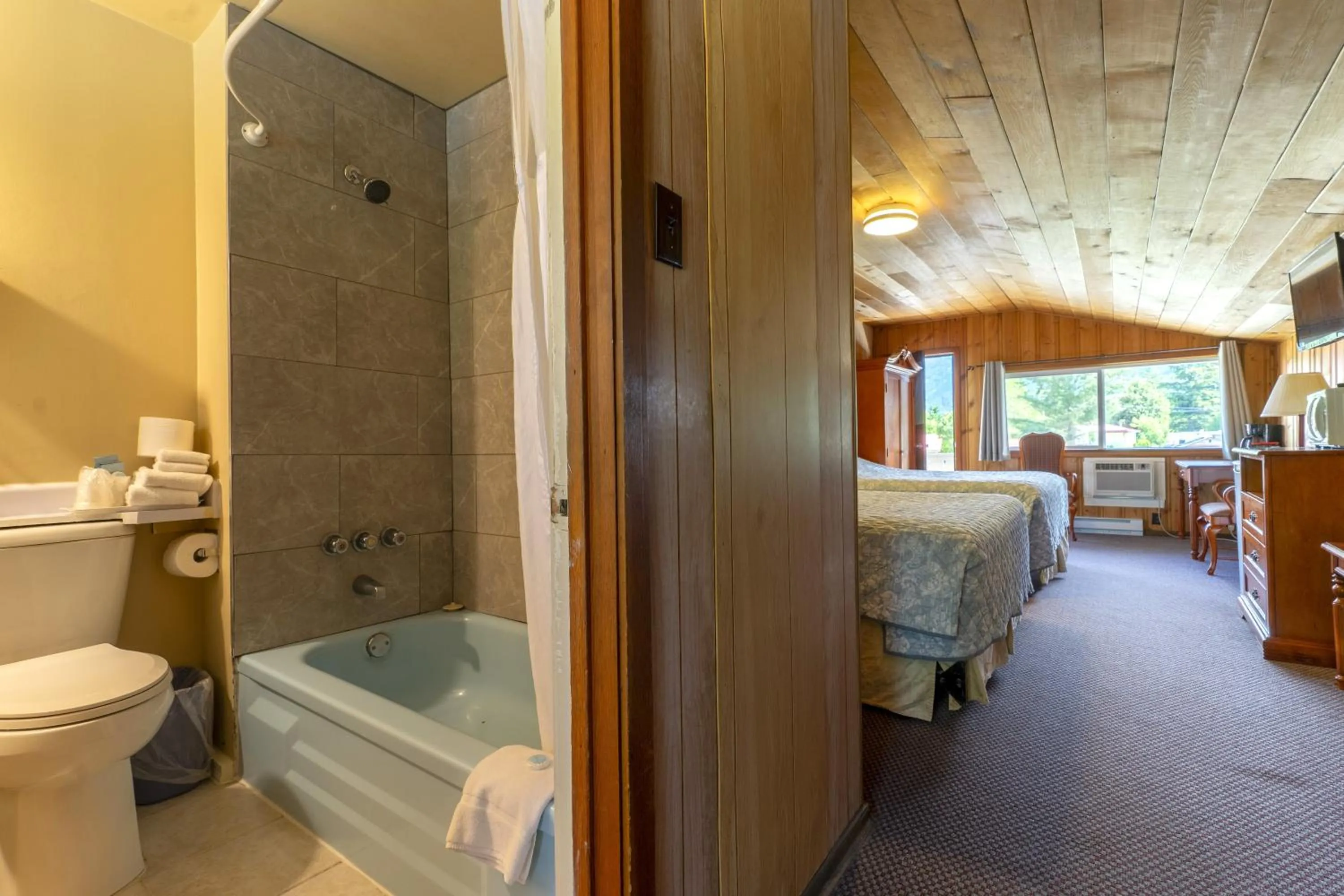 Bed in Richca Chalets Resort