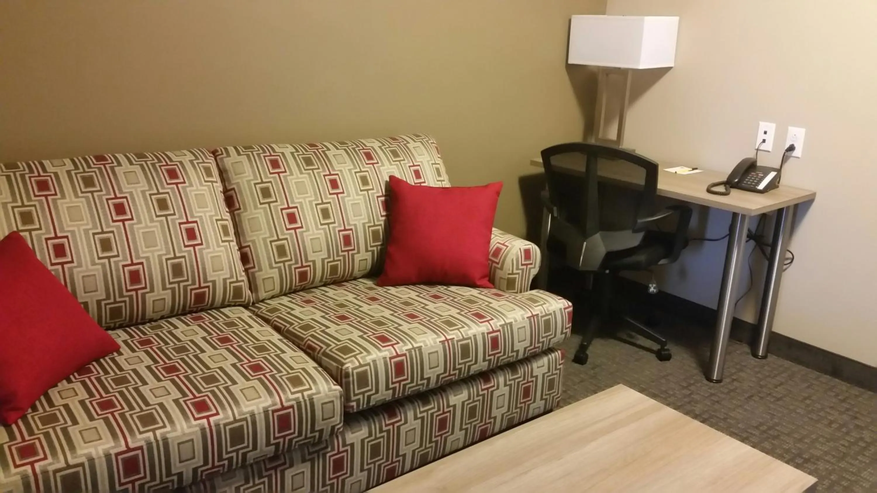 Seating area in Super 8 by Wyndham Mont Laurier
