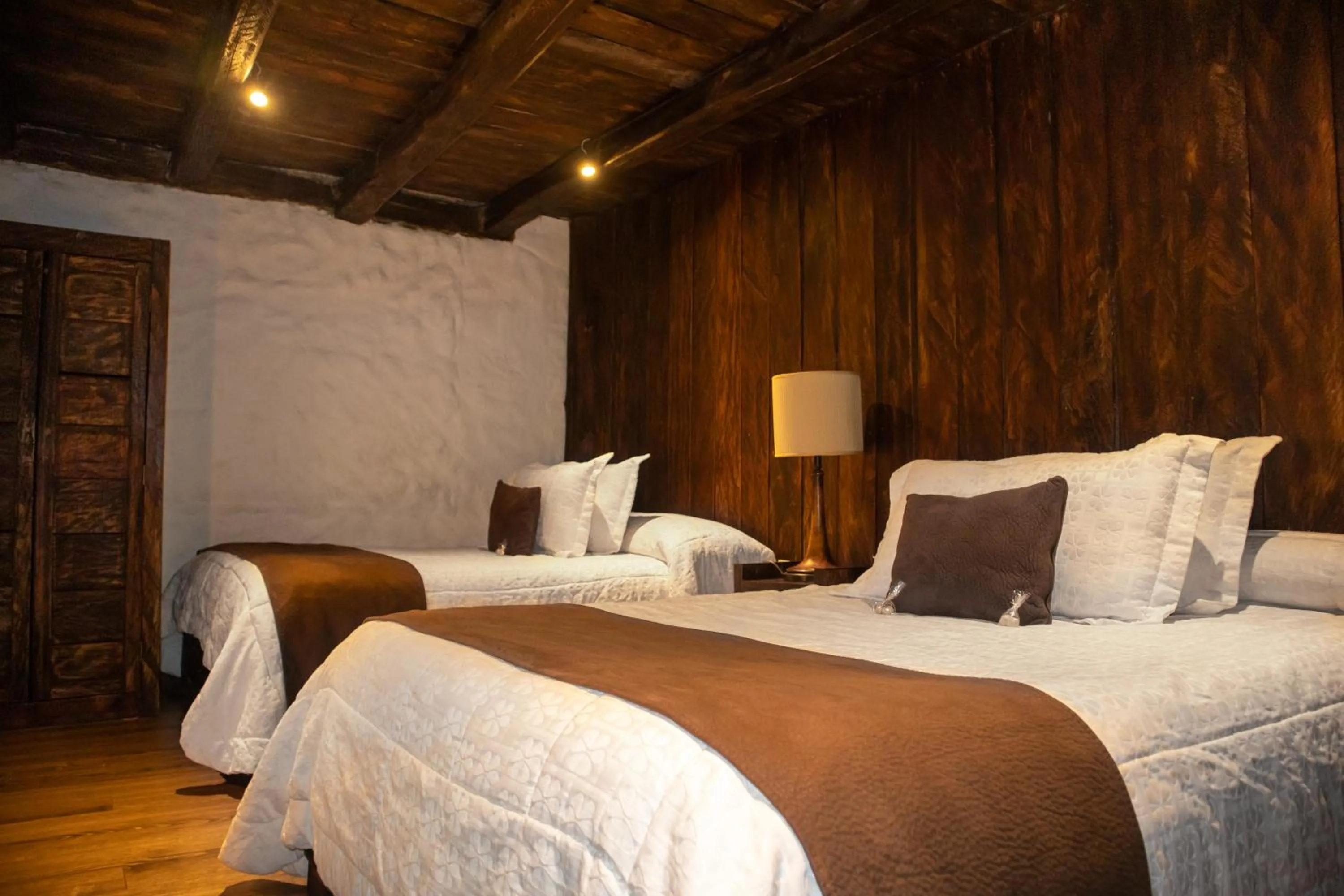 Bed in Hacienda Hostería Dos Chorreras