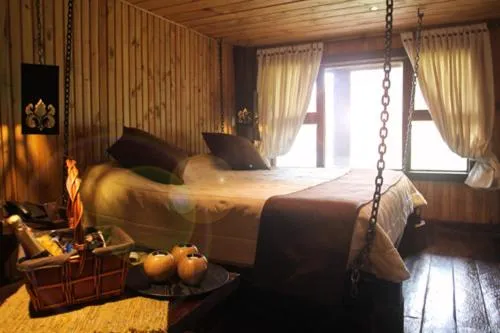 Bed in Hacienda Hostería Dos Chorreras